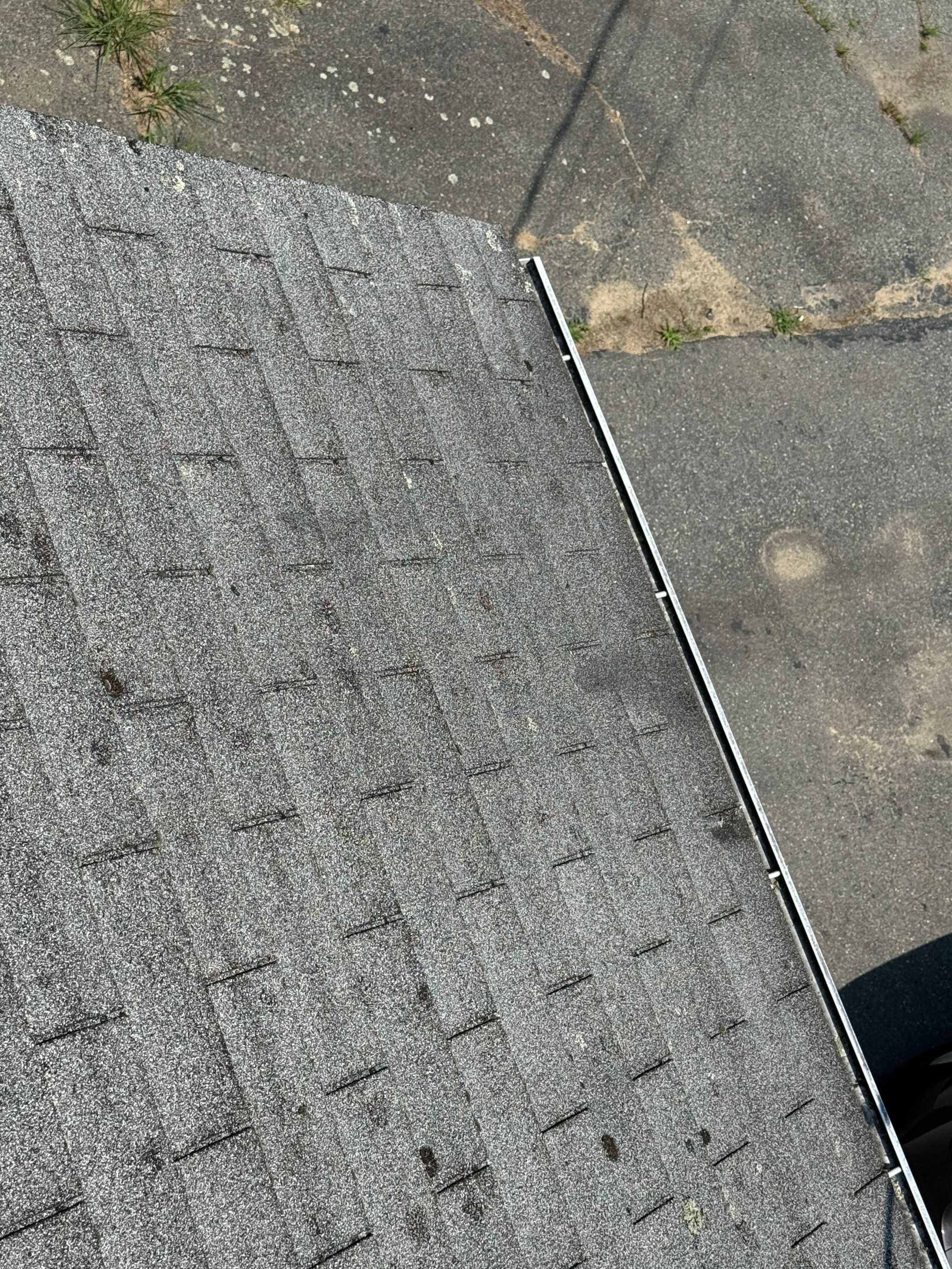 Onyx Black Roof Transformation in Maynard, MA by Mighty Dog Roofing of Greater Middlesex County