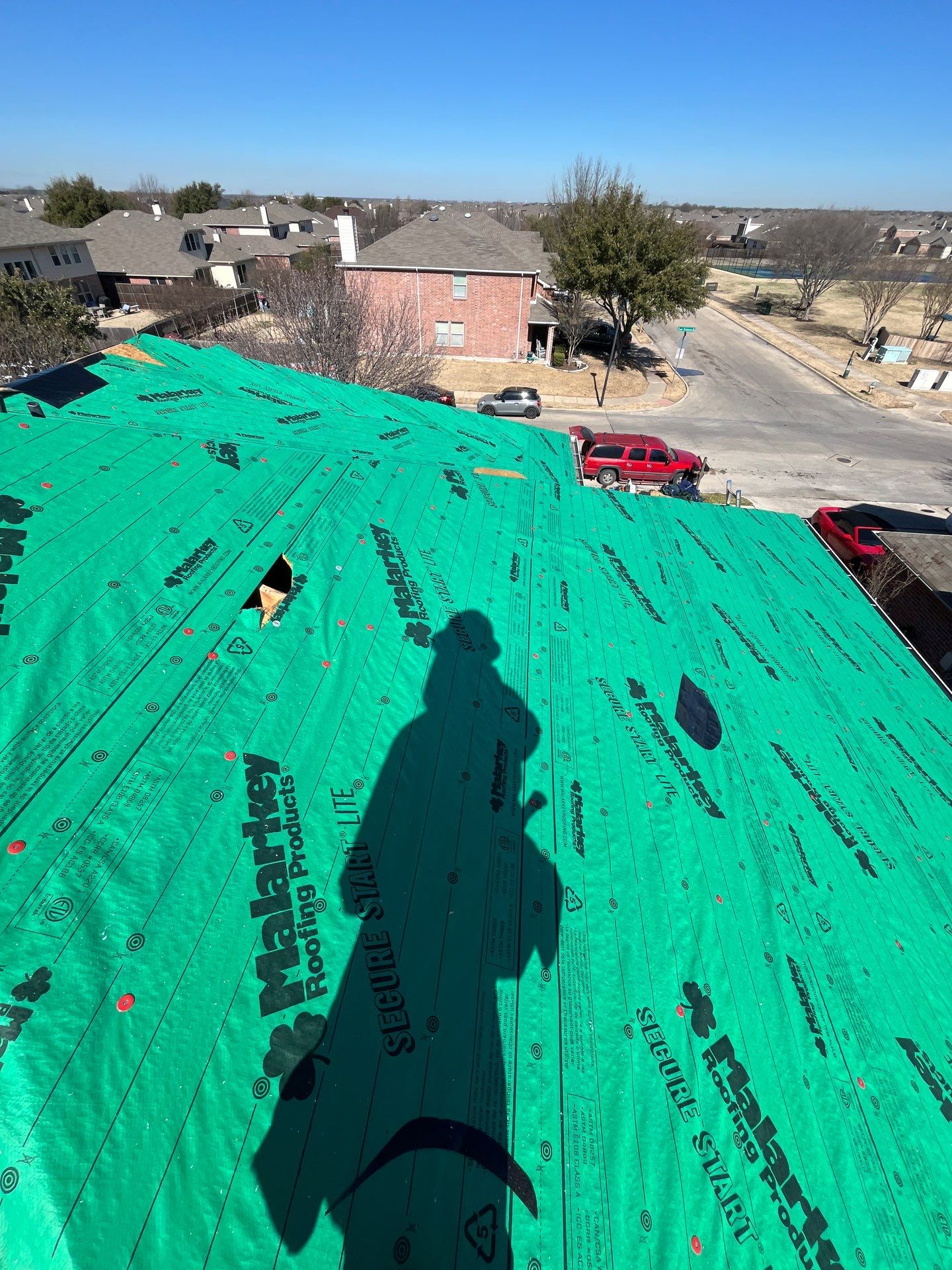 Reroof and Gutters by Berry Good Roofing 
