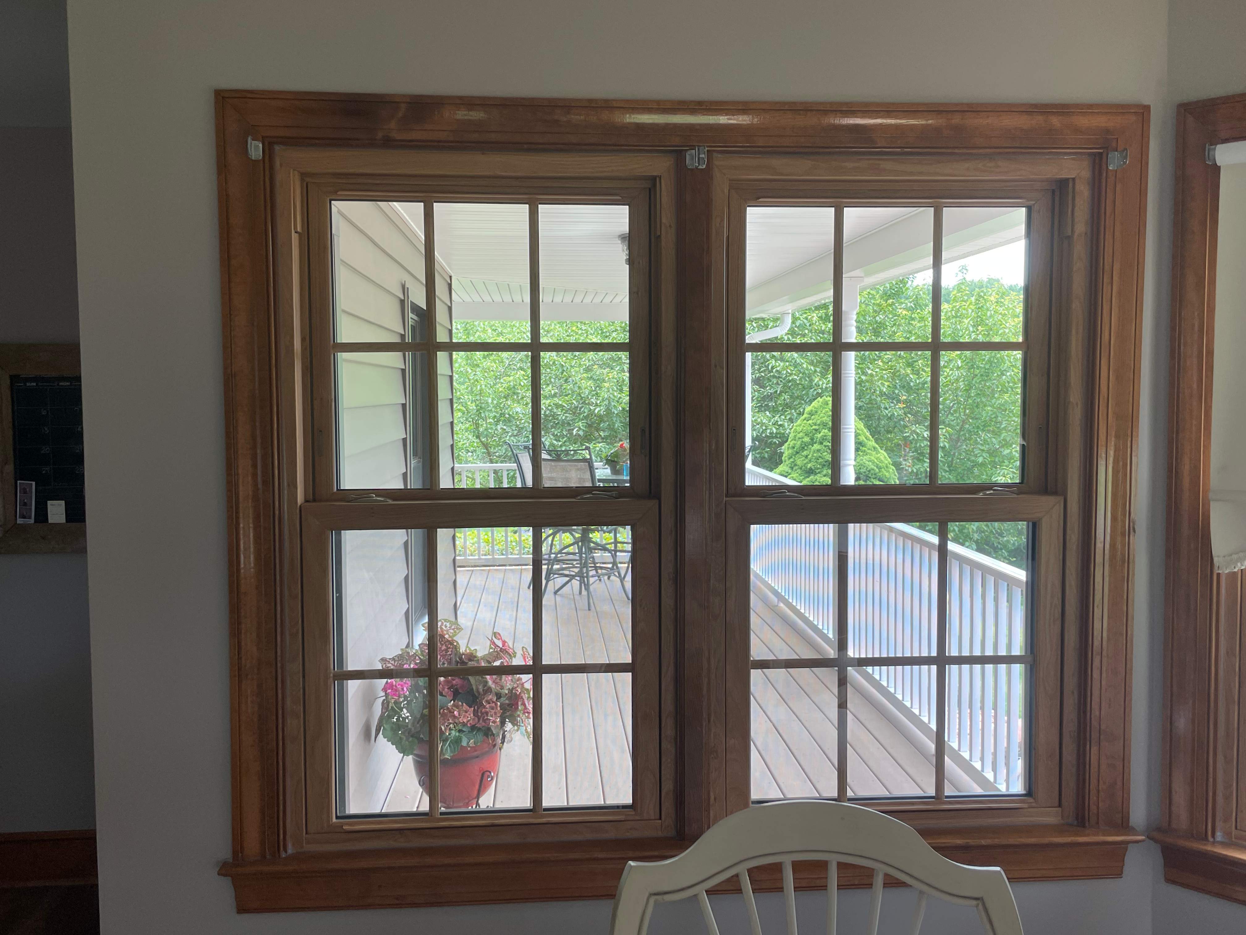 Exterior remodel including window replacement by American Home Contractors