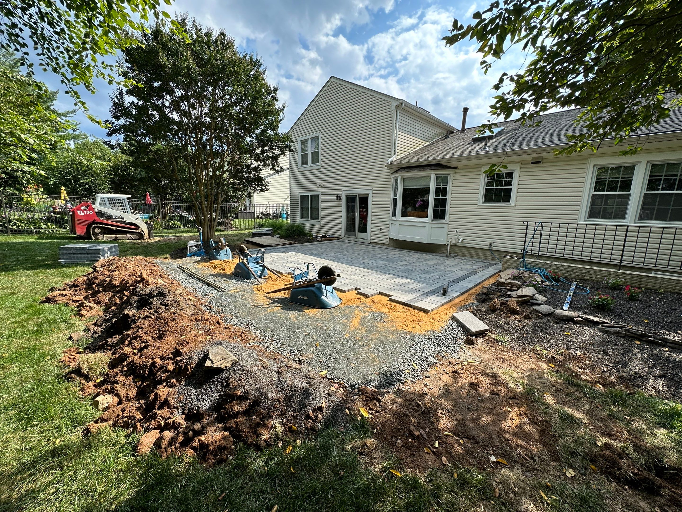 Backyard Transformation using Techo-Bloc Pavers by The Smet Companies, LLC