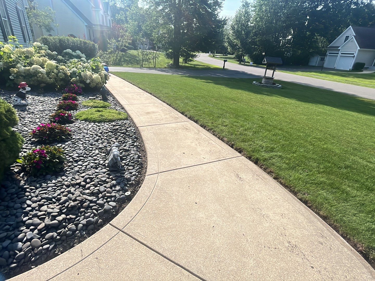 Scarelli Garage & Walkway TransFLOORmation by Symphony Concrete Coatings