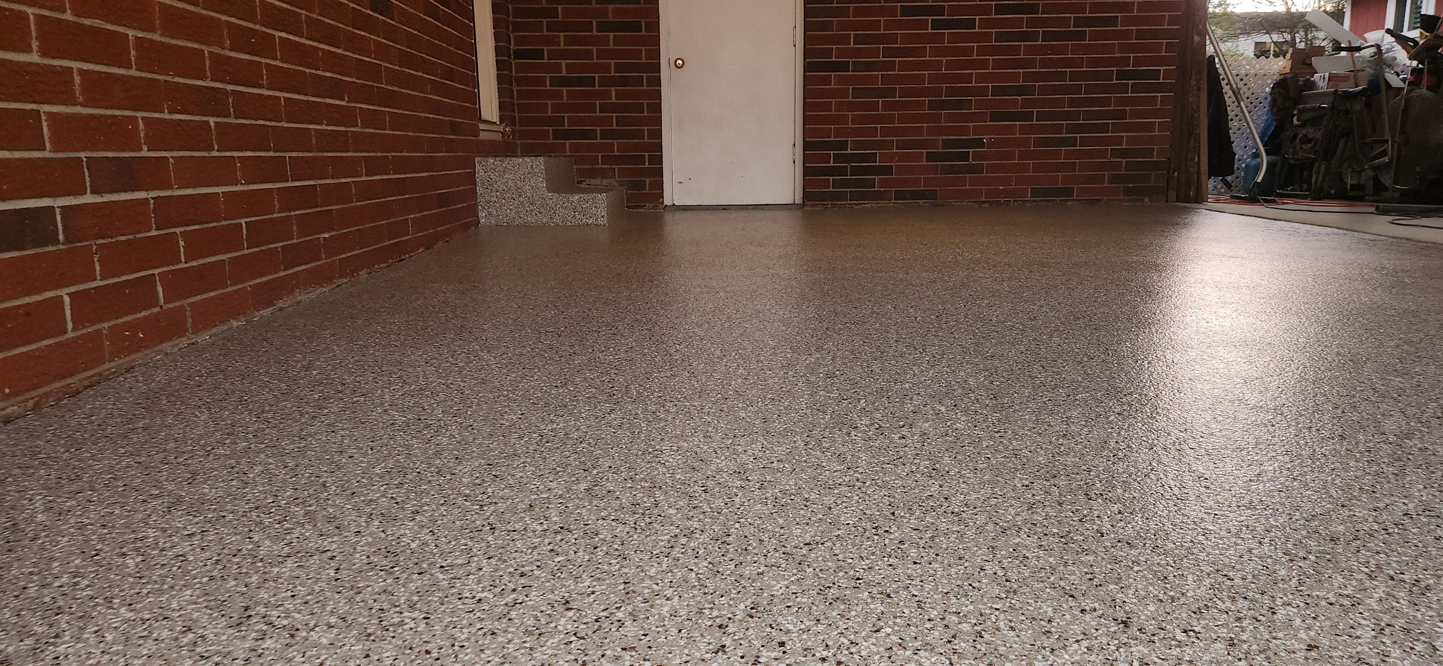 Back Patio using Creekbed by Elite Floor Solutions