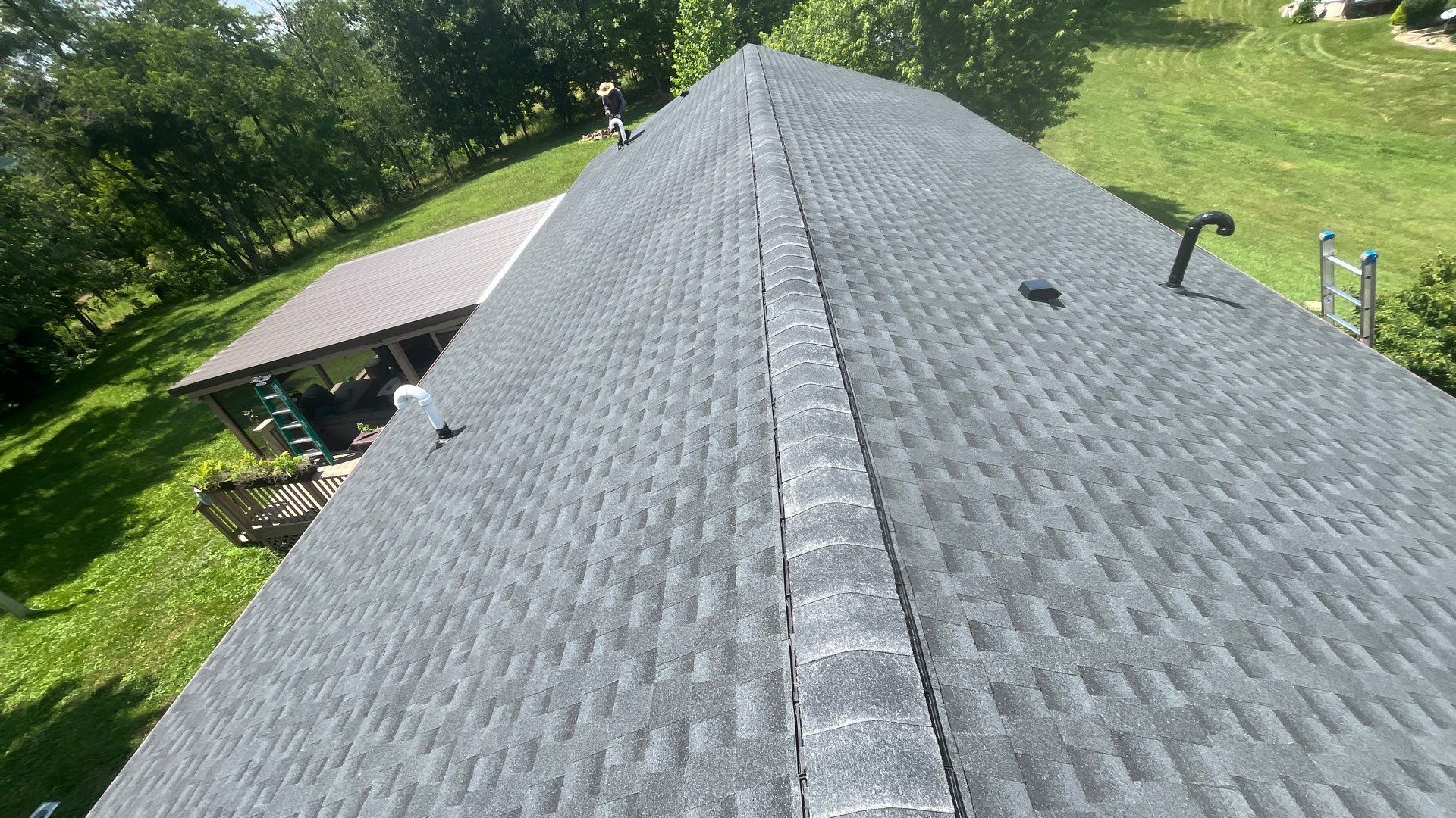 Residential Roofing Installation using GAF Timberline HDZ Charcoal by Rainstoppers Roofing