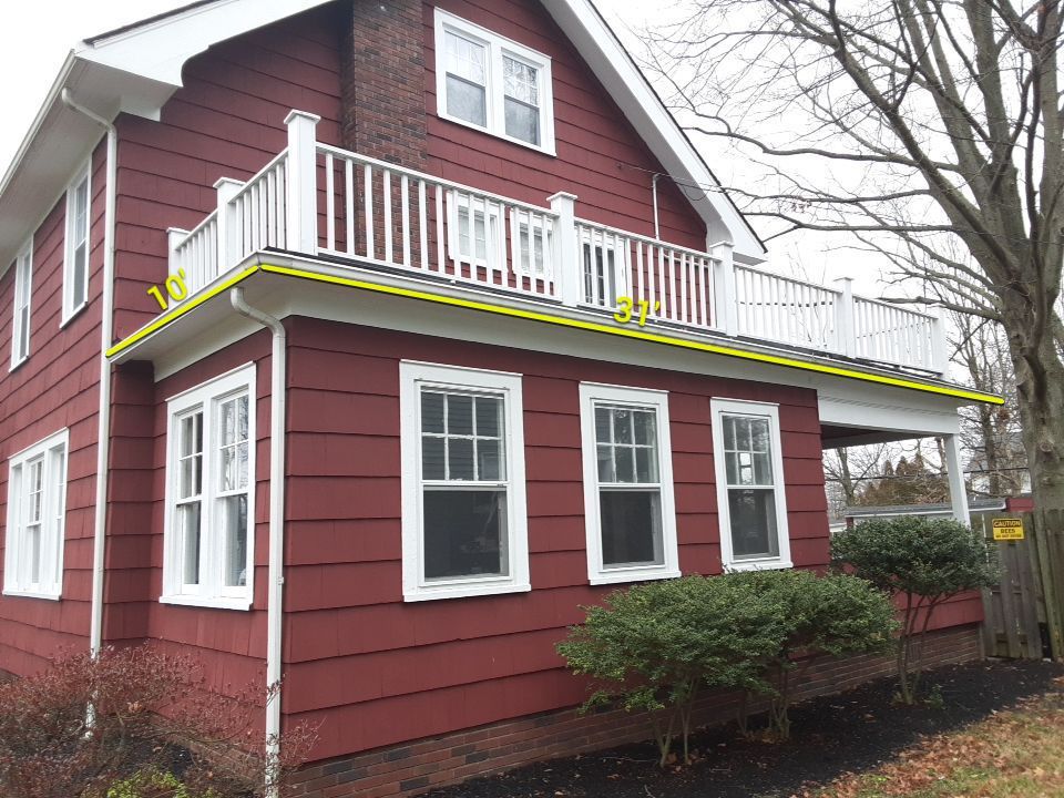 Residential Roof Replacement using Patio Roof by Absolute Roofing and Construction