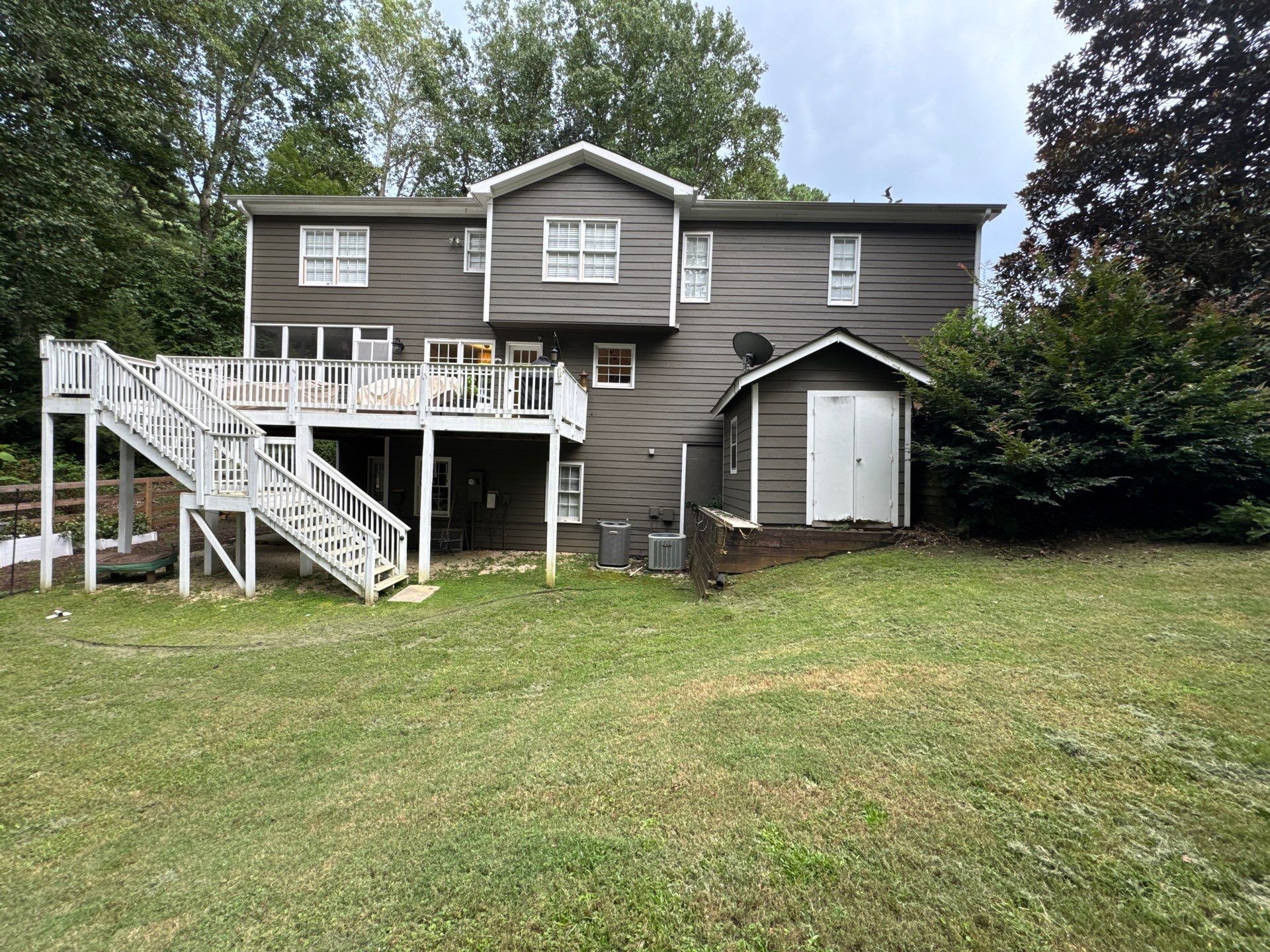 Marietta, GA Full Siding Replacement, 30+ Window Replacements, Screened-In Porch to Sunroom Conversion, Gutter Replacement, and Exterior Painting by Nelson Exteriors