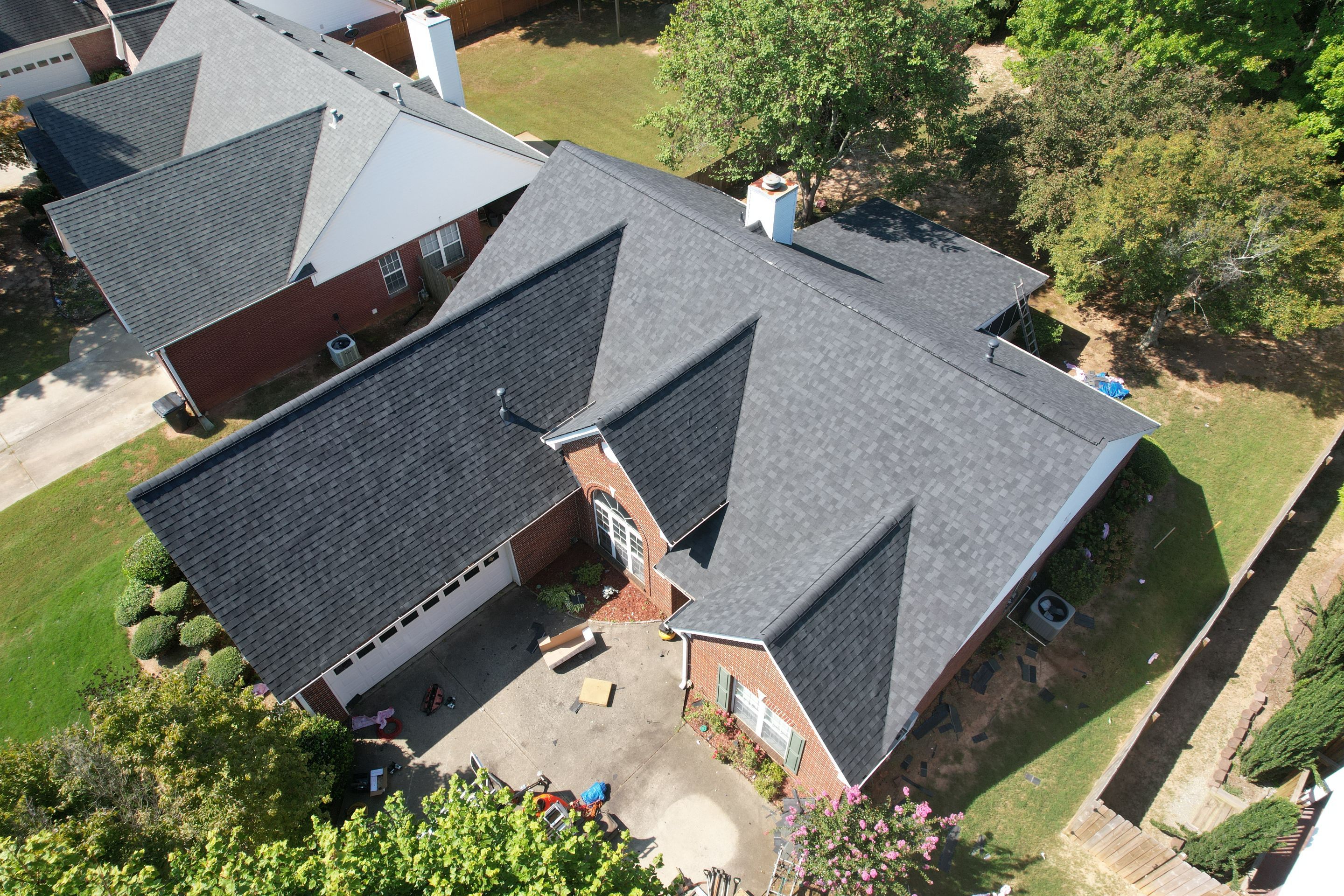 Residential Roof Replacement using Owens Corning Onyx Black by Inspector Roofing and Restoration
