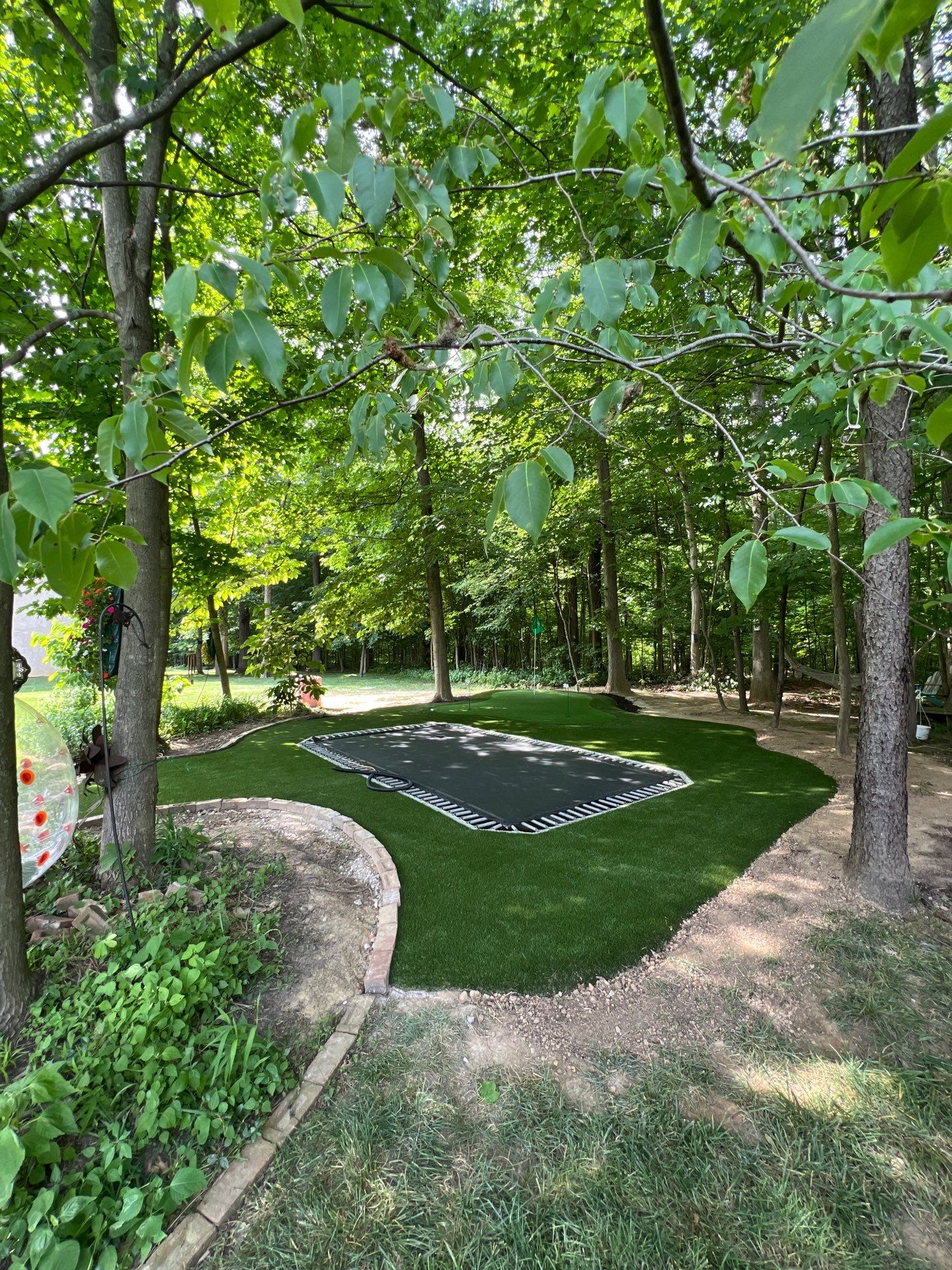 Green and Lawn around trampoline Galena, OH by Southwest Greens Midwest