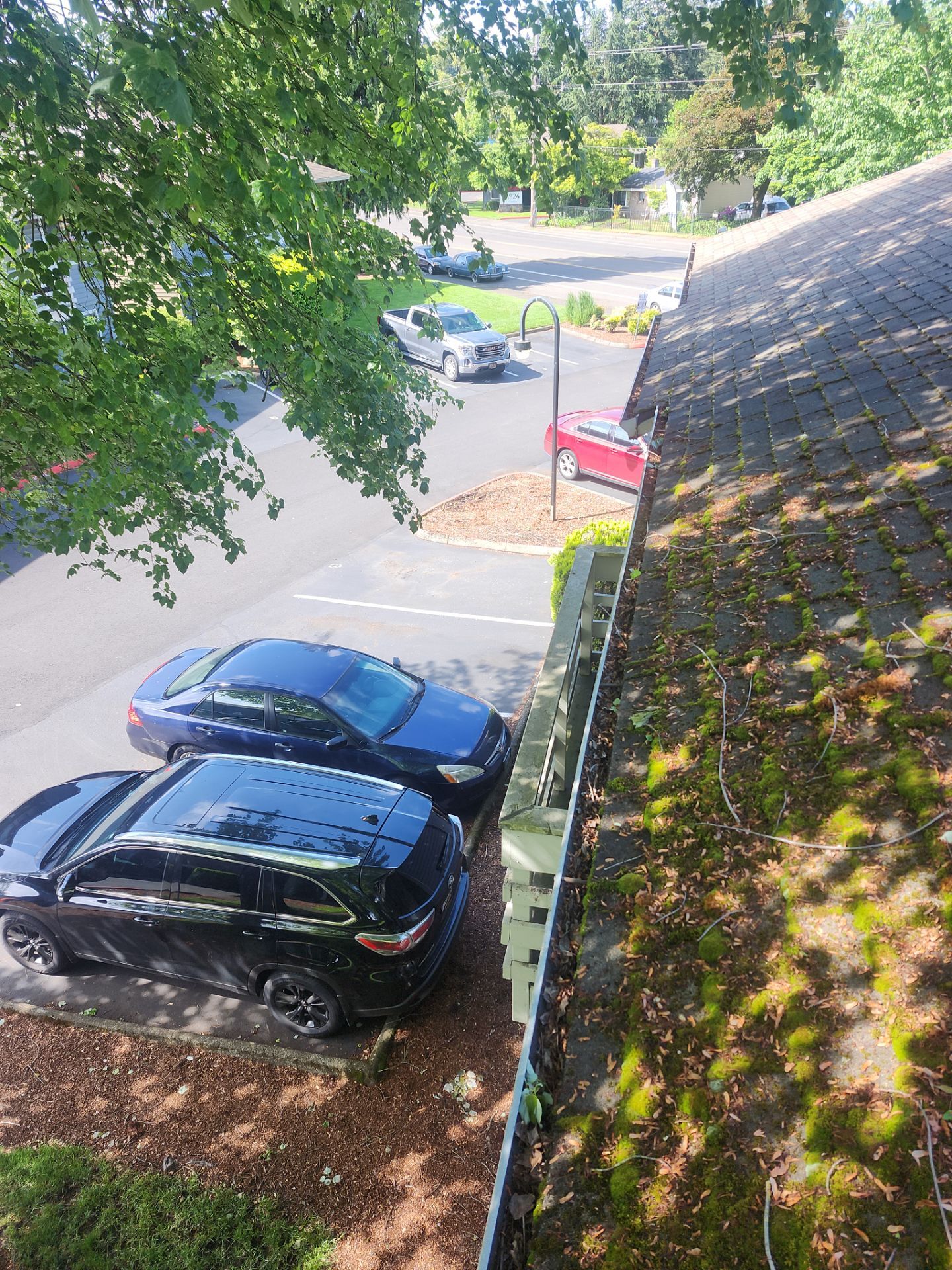Commercial gutter cleaning Gresham, OR before photo with filled gutters