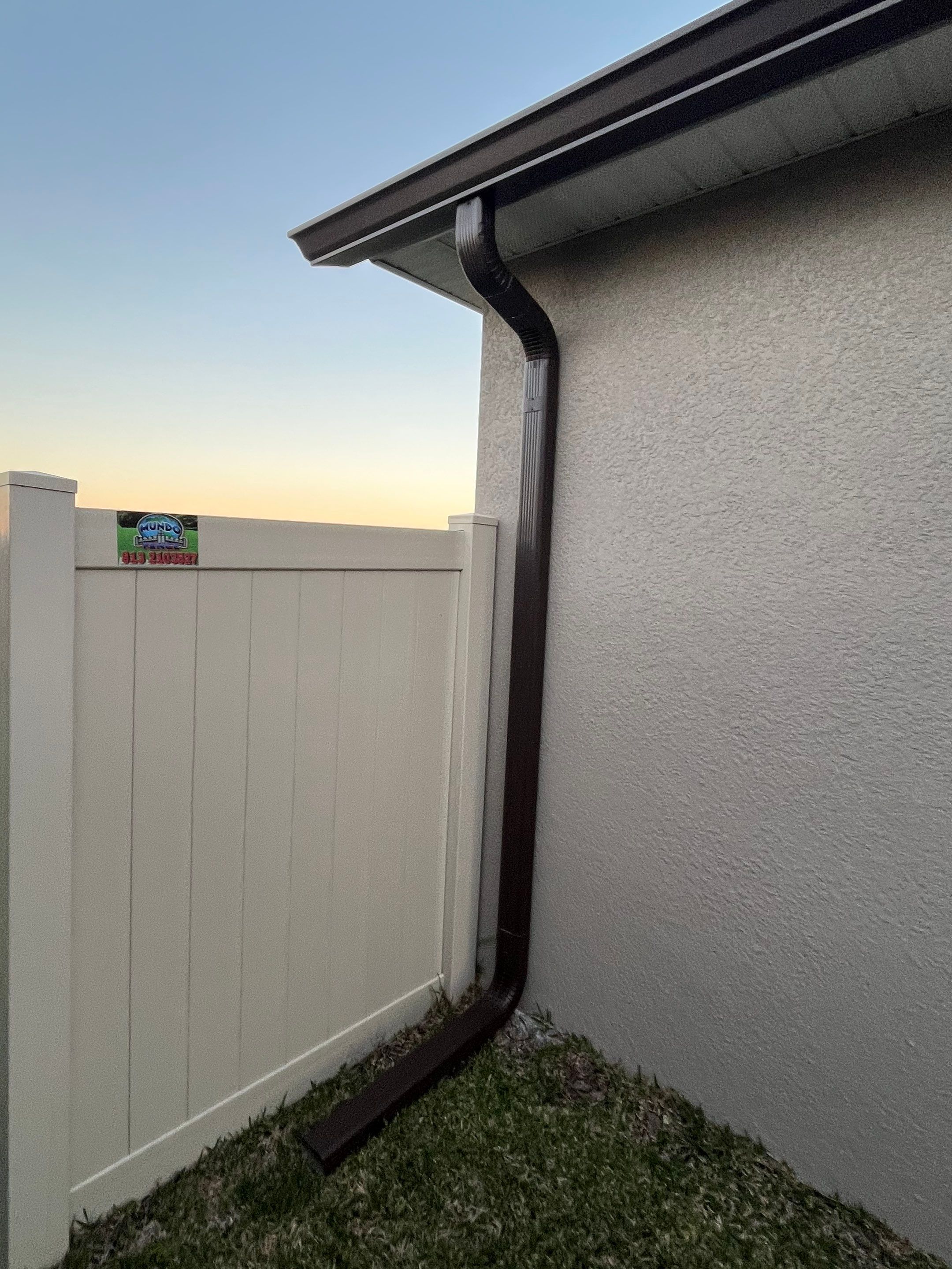 3X4 elbow Downspouts using Musket Brown Seamless Gutters in Lakeland FL by Gutter Professors