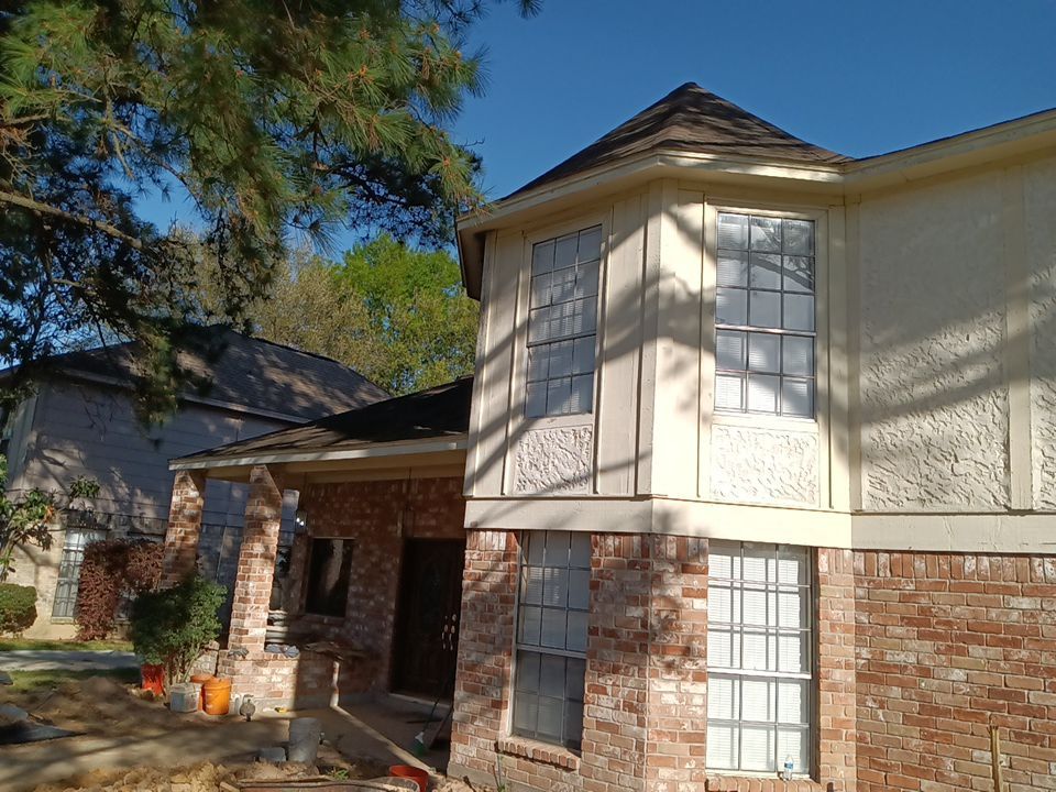 Interior and exterior painting project by Roof Concepts Construction