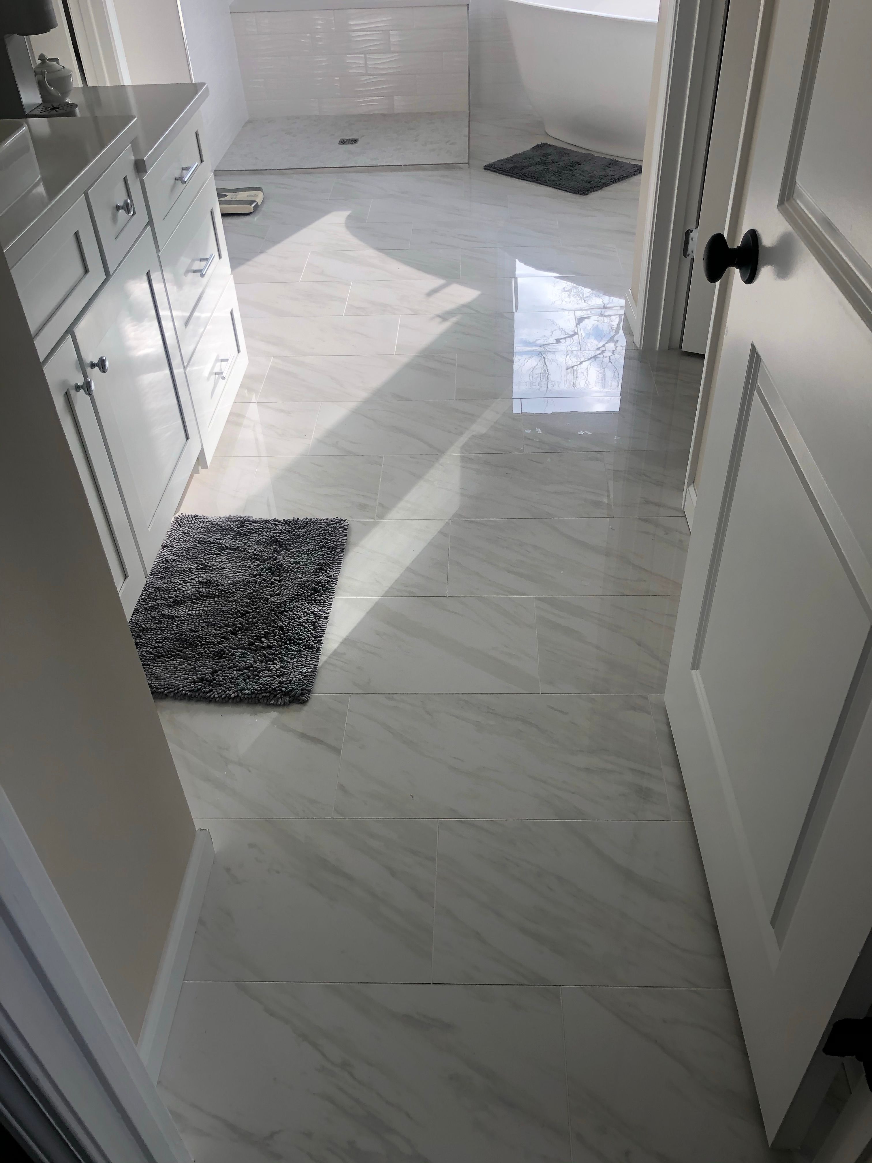 Modern Bathroom Remodel With Freestanding Tub In Marietta by Swift Home Renovations