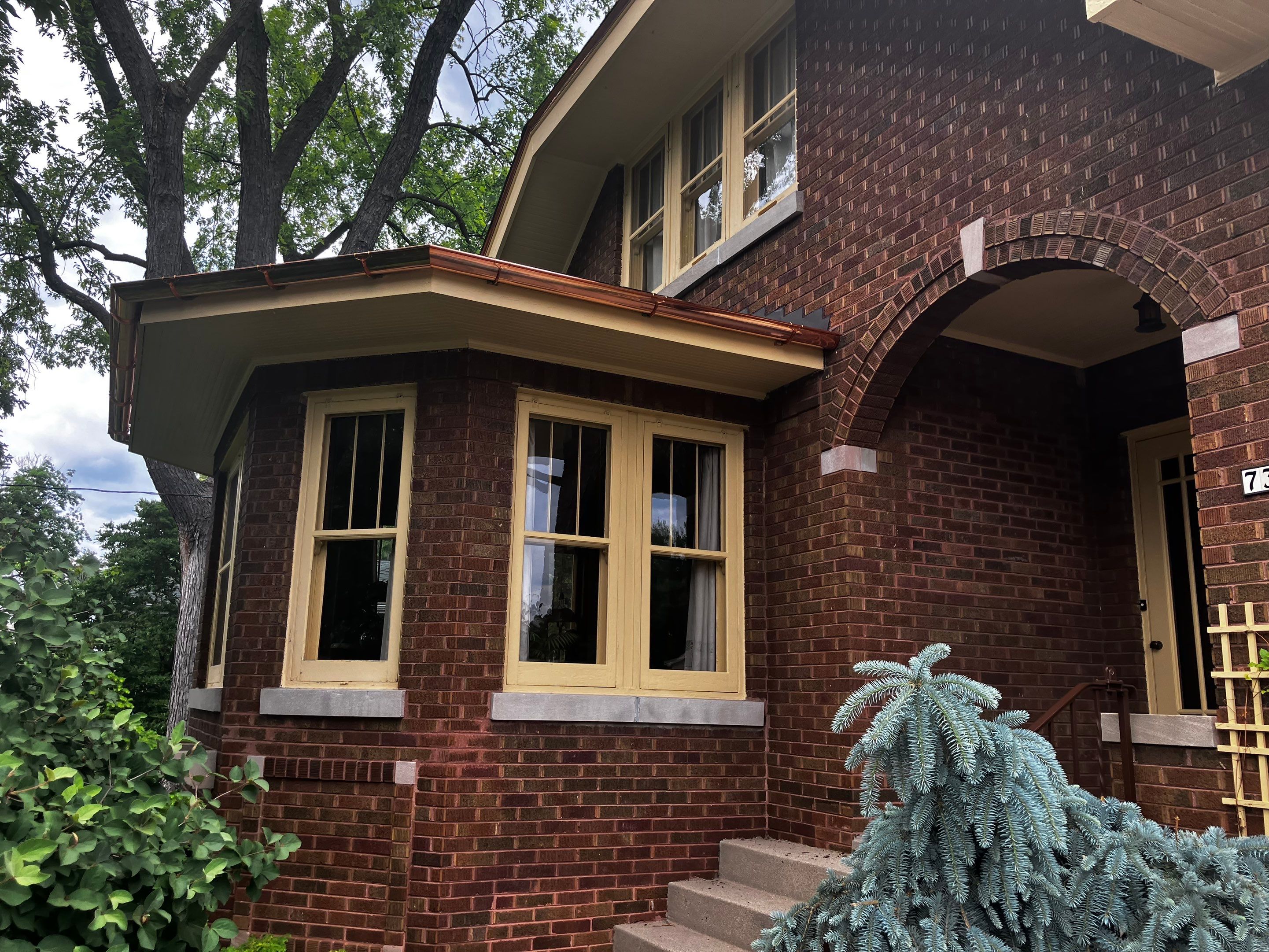 Asphalt Shingle Replacement and Half Round Copper Gutters Installation by Custom Installations, Inc.