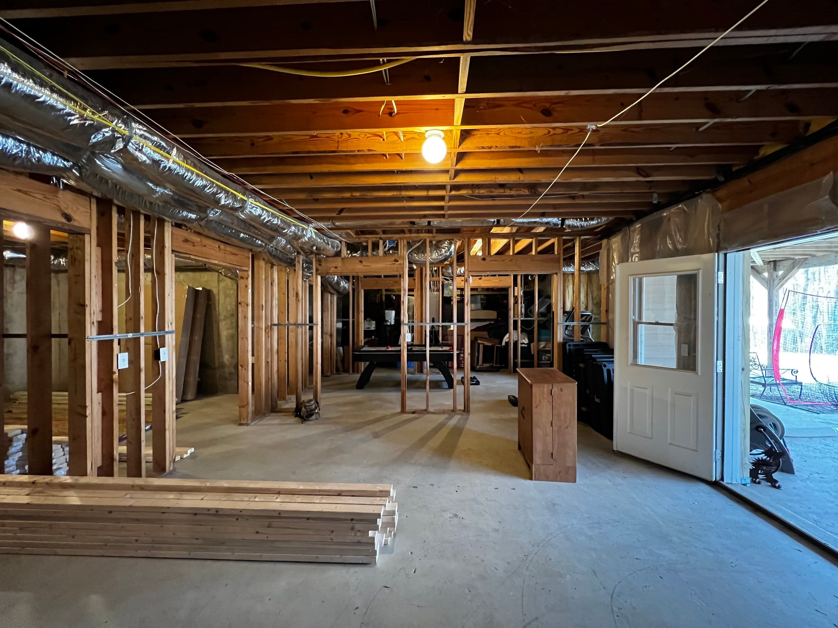 Custom Basement Remodeling With Home Theater and Bar in Woodstock by Swift Home Renovations