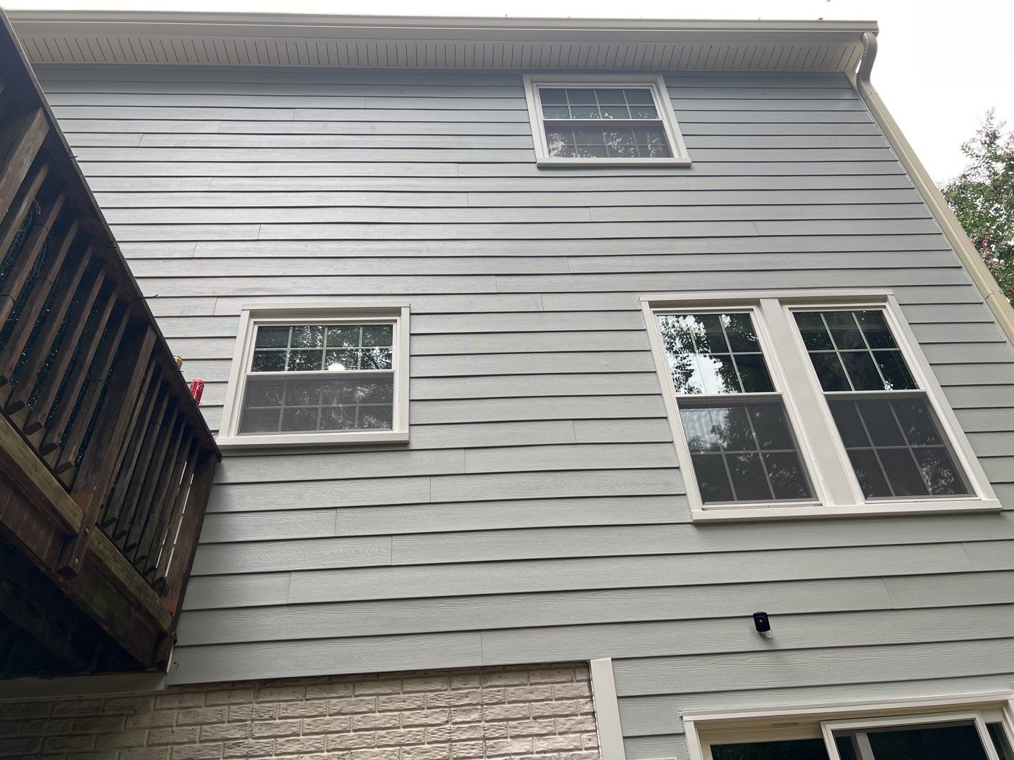 Exterior Home Makeover using GAF Timberline HDZ, GAF Decotech, and James Hardie Siding by American Home Contractors