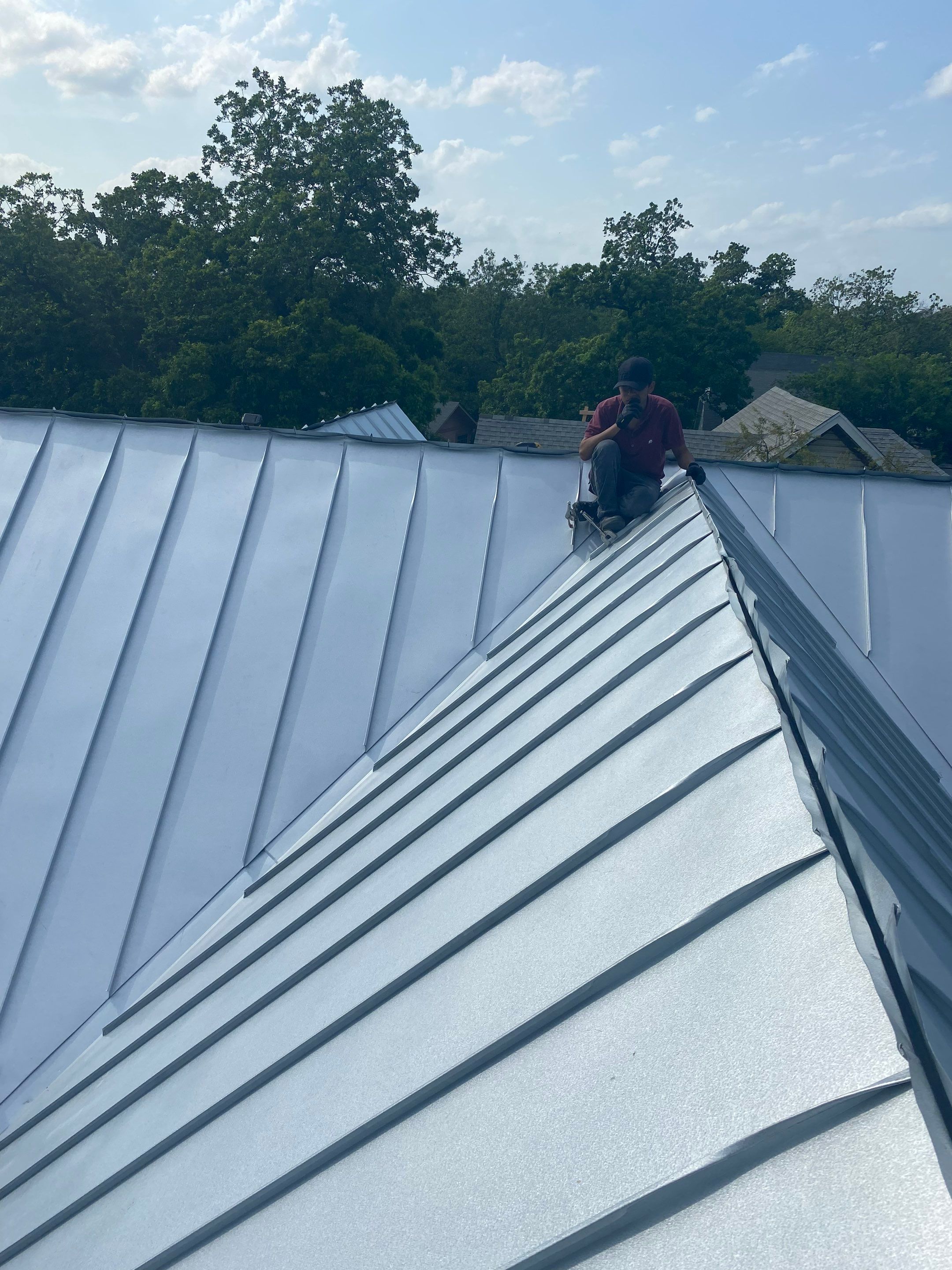 Residential Metal Roof Installation using McElroy Metal by Premier Roofing and Contracting