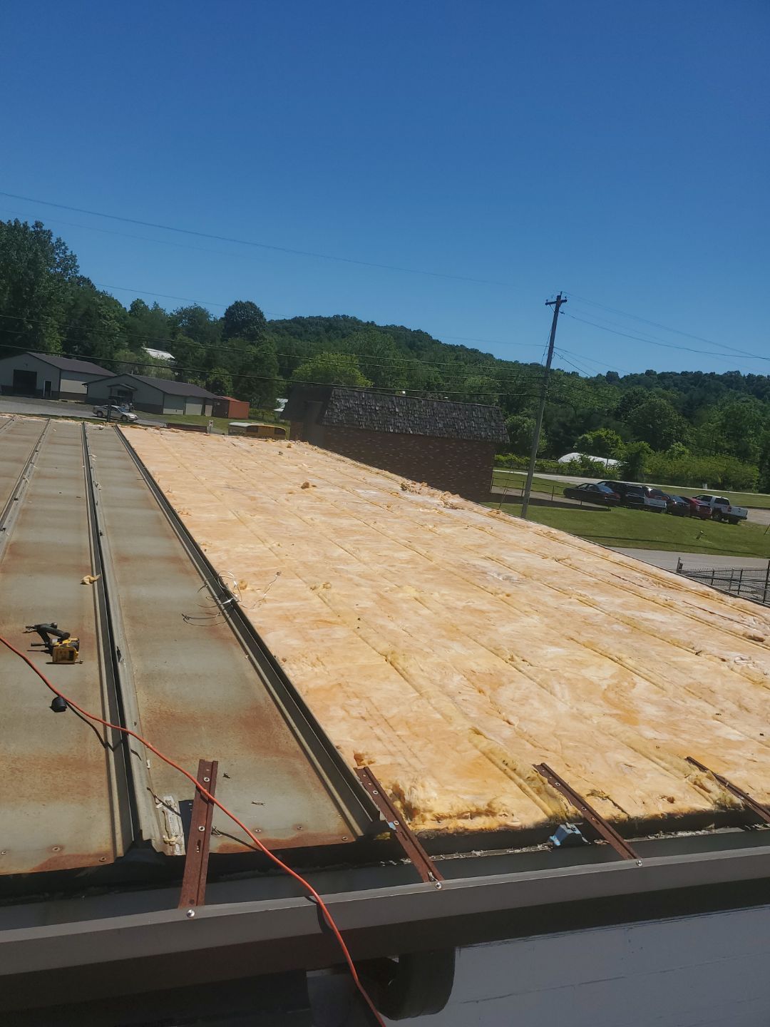 Commercial Roofing Installation using Metal by Rainstoppers Roofing