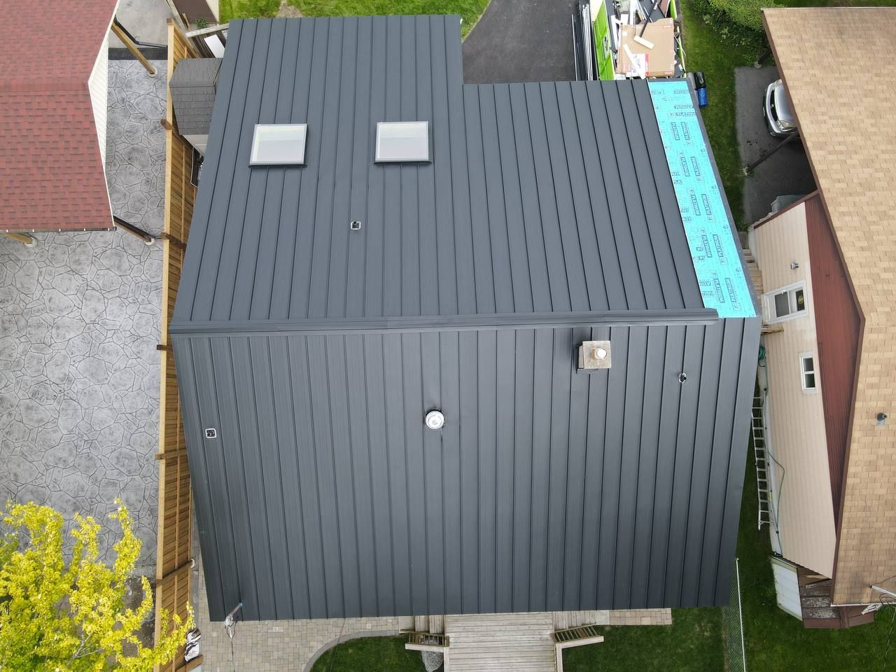 Residential Roofing Installation using 16" Standing Seam Panels by Jay Carter Roofing & Sheet Metal