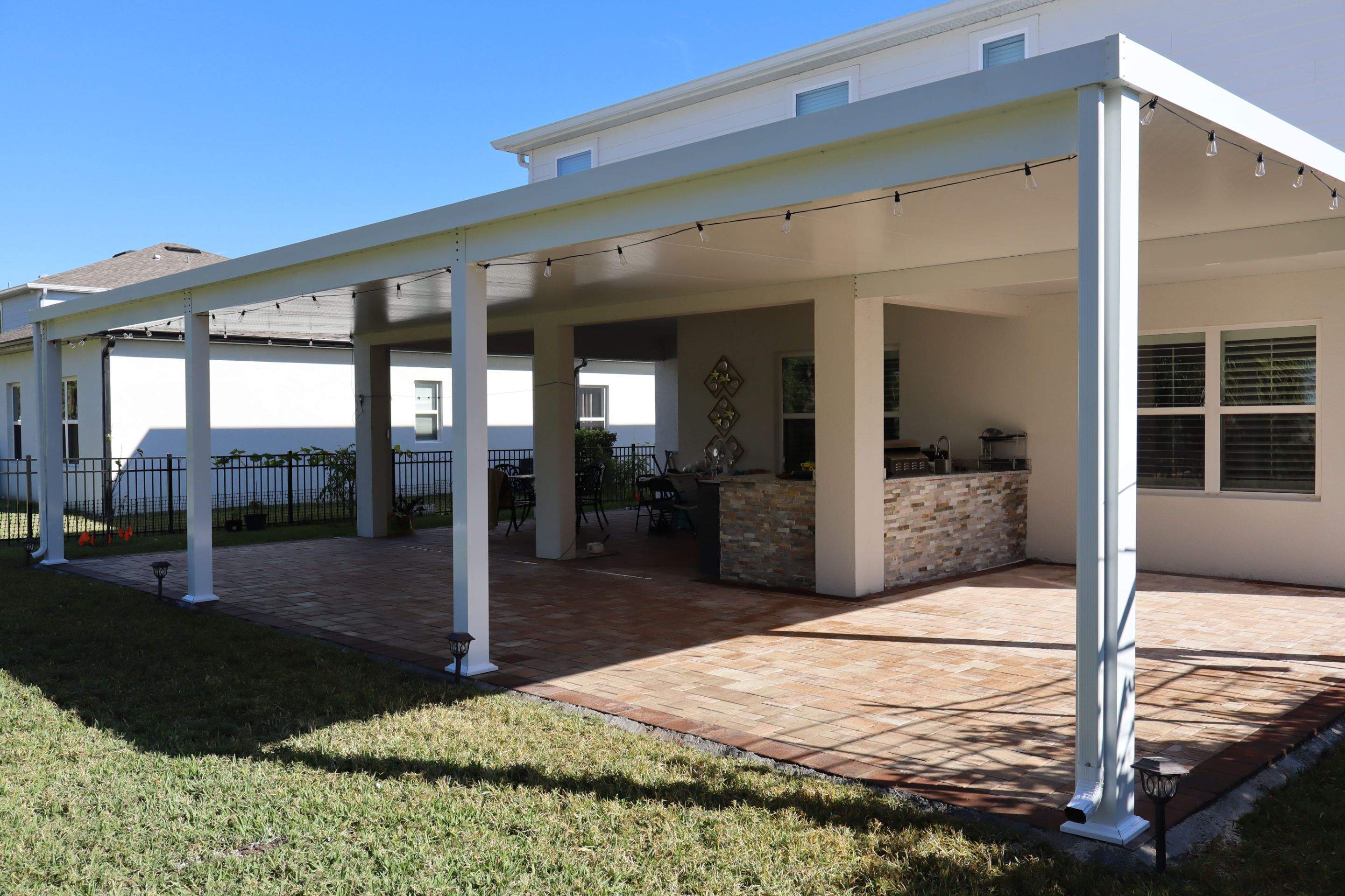 Patio cover with kitchen by Orlando pergolas 