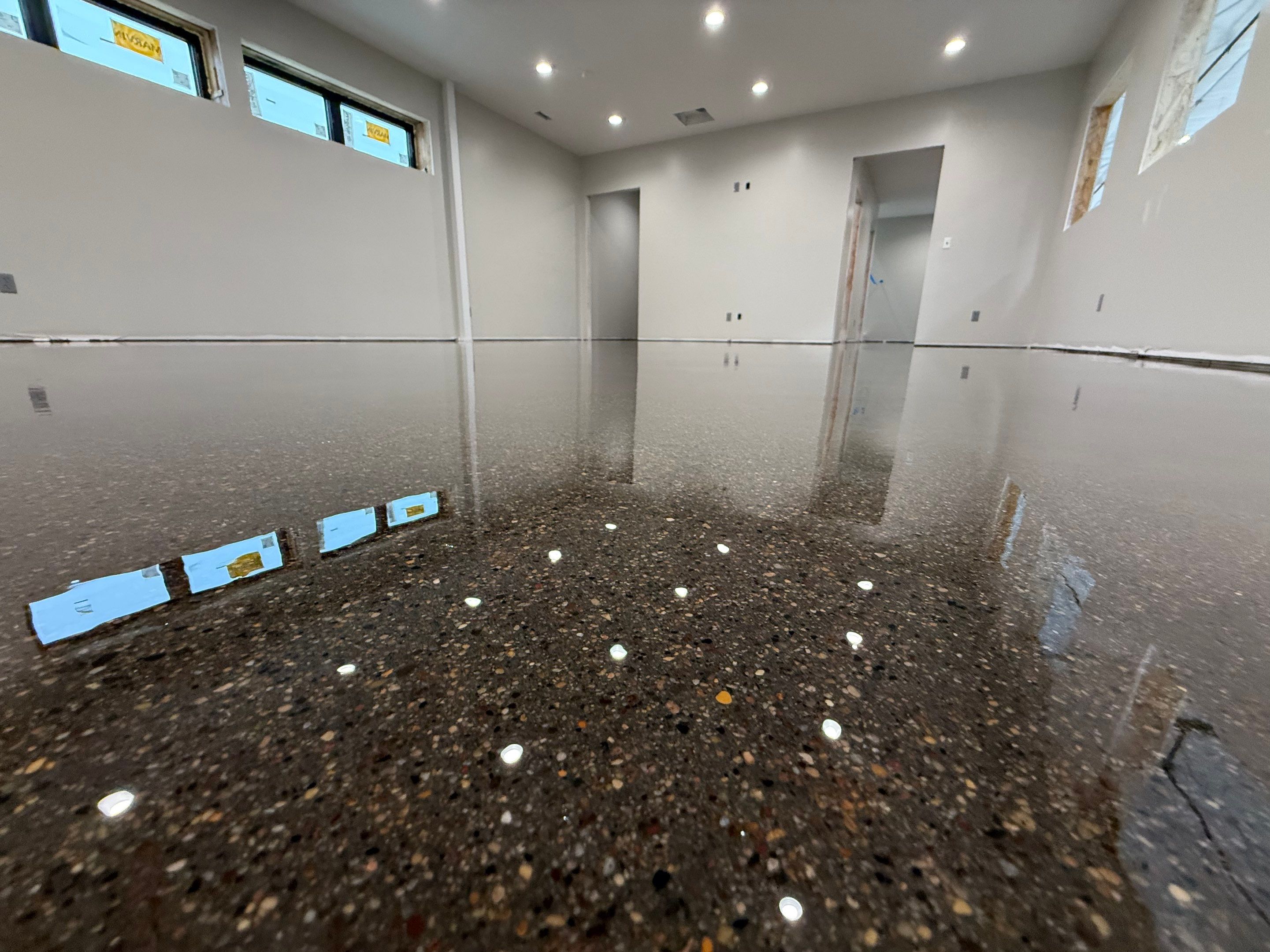 Industrial Concrete Polishing and Coating for Large Manufacturing Warehouse by Select Painting, Coatings & Garage Cabinets