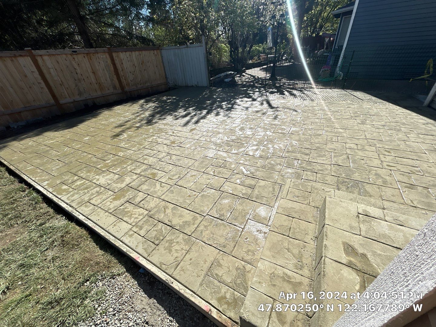 Benedict | Stamped Concrete Back Patio by Jireh Asphalt & Concrete Inc 