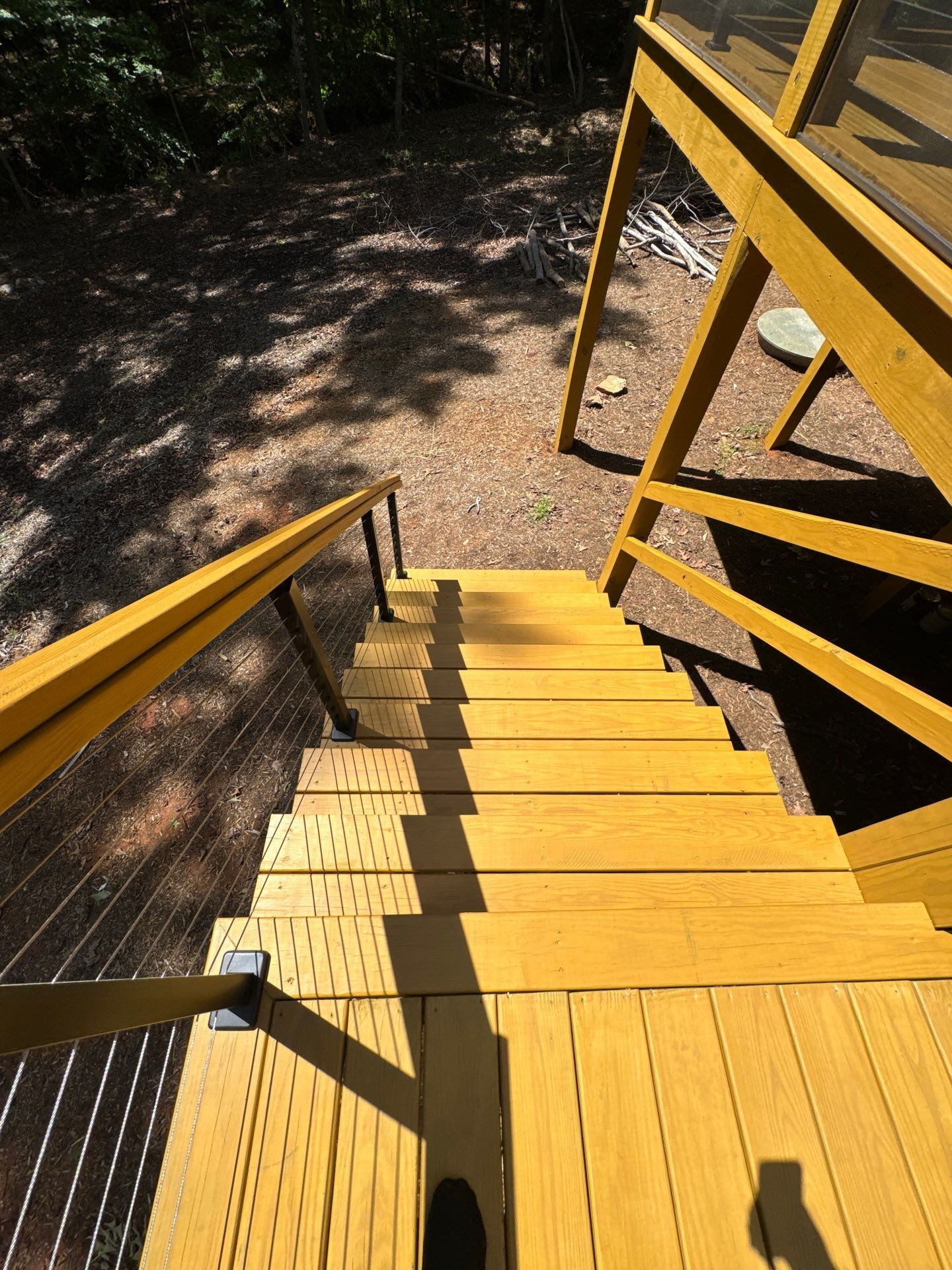 Porch and Deck staining  by GonzalezPainters & Contractors Inc 