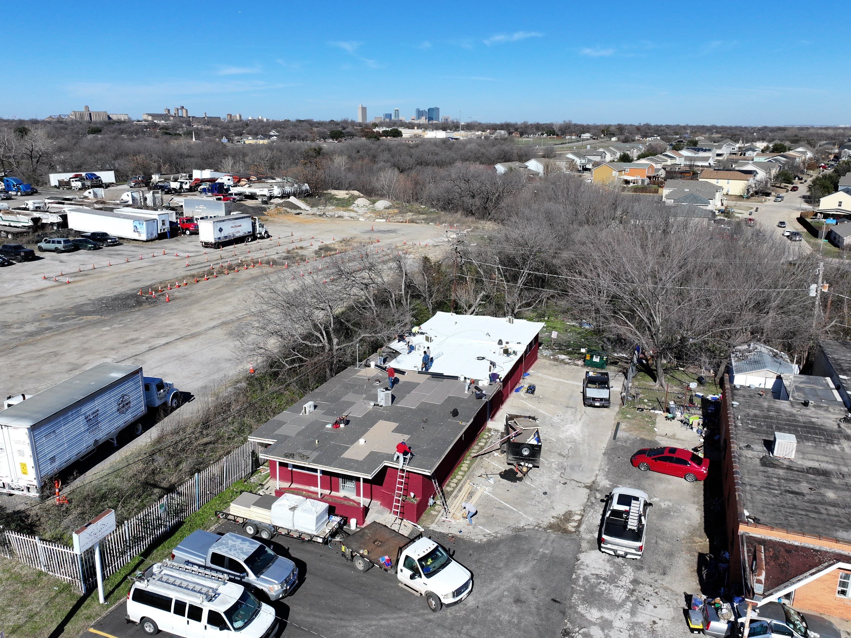 Commercial roofing overlay using GAF TPO over an old ballast roof by Becker Roofing and Exteriors