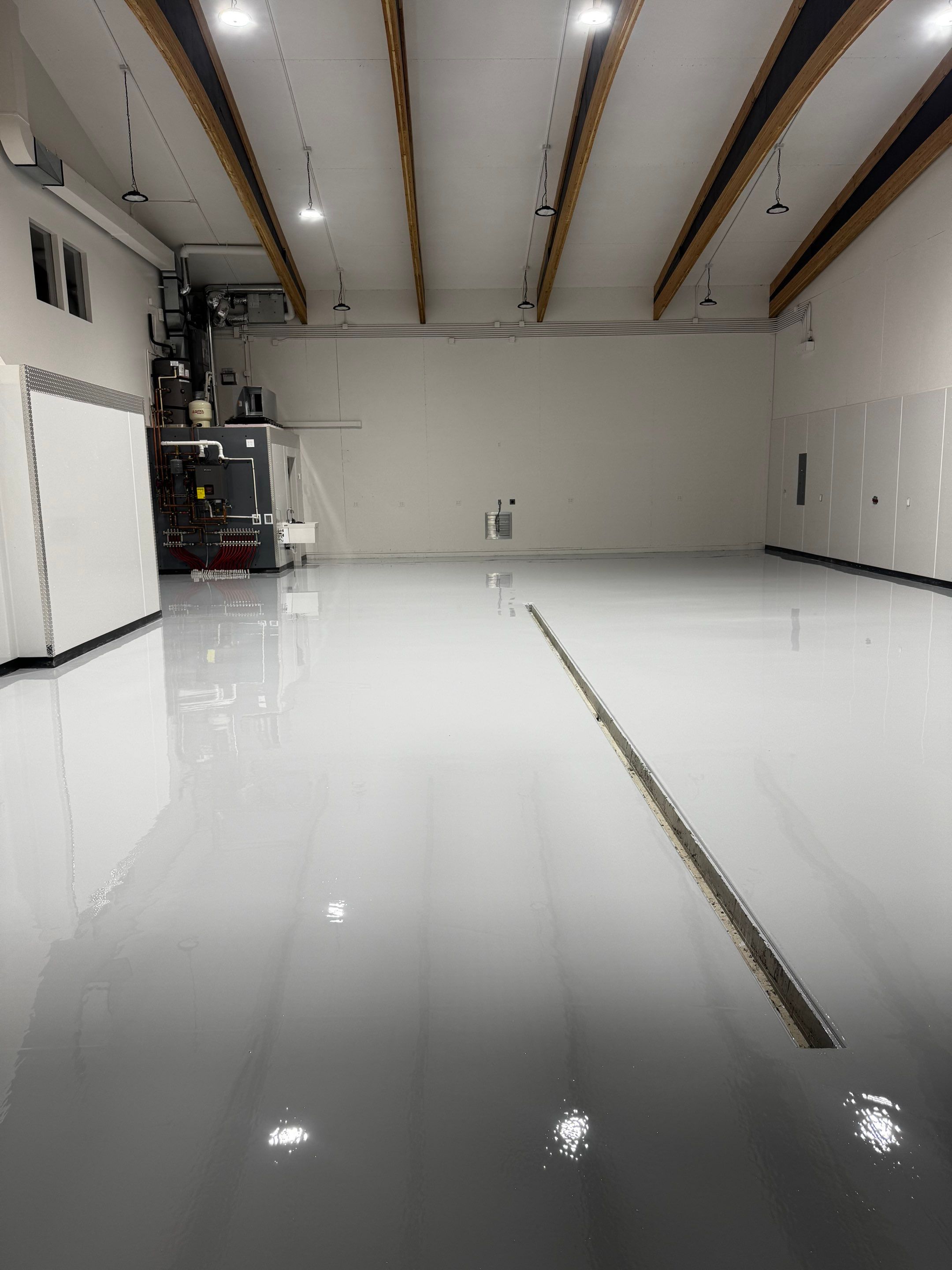 Colfax Commercial Shop Transformation With Vapor Mitigating Floor Coatings by Croc Coatings, LLC