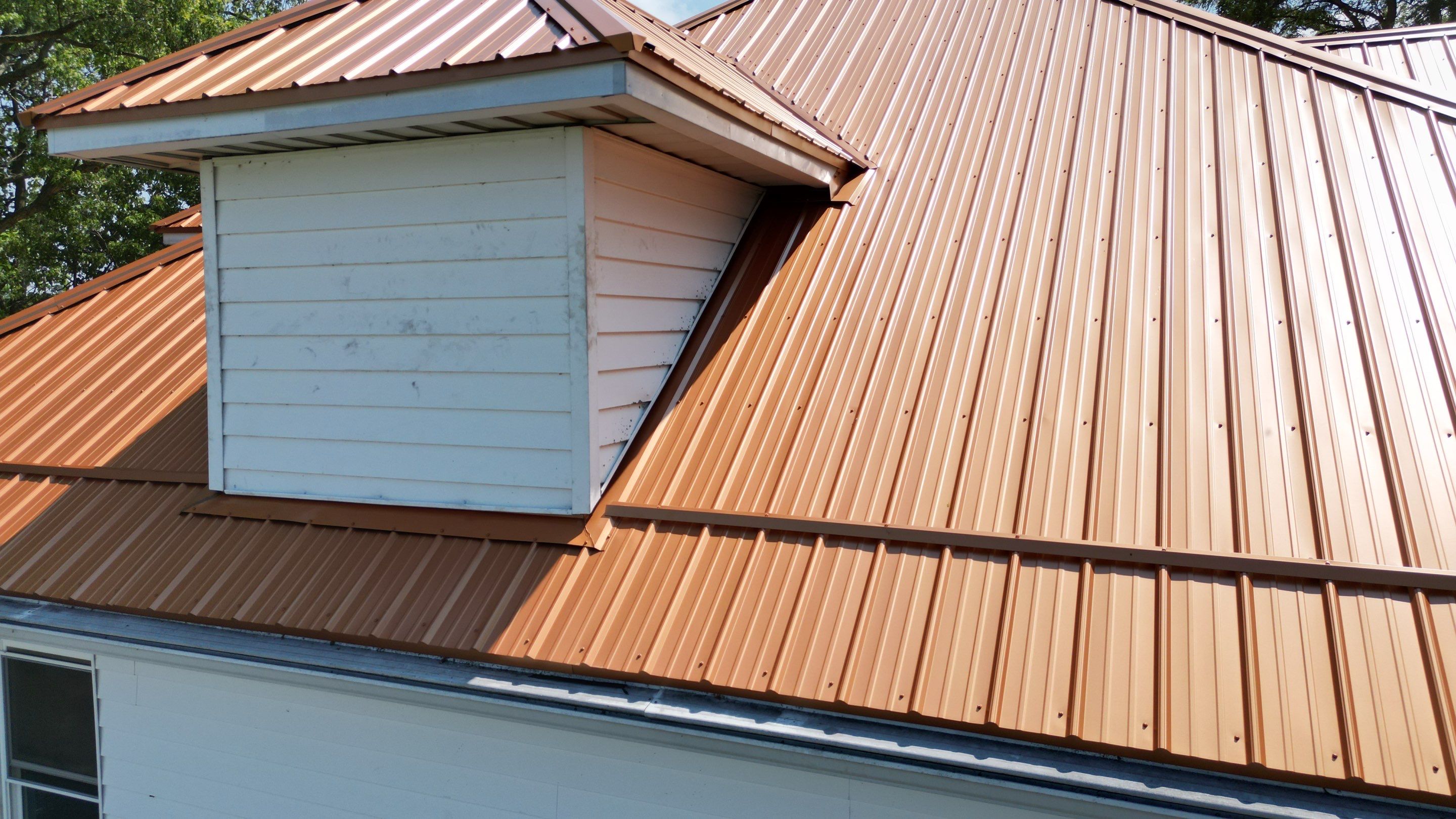 Residential Roofing Installation using Performance Panel Metal - Copper Metallic by RoofX 