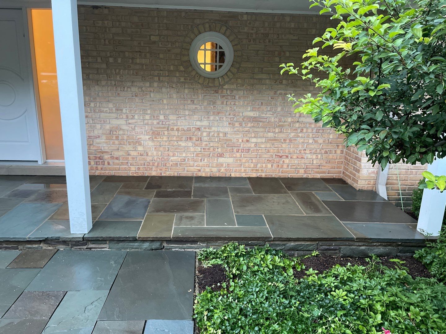 Bluestone patio cleaning by Northern Power Washing LLC.