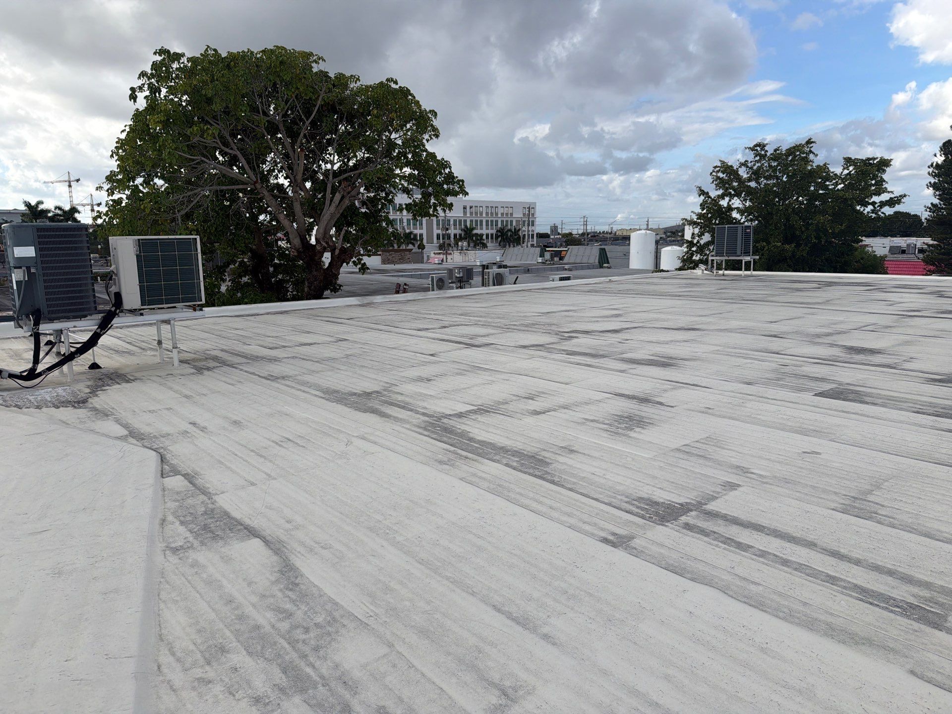 Commercial TPO Flat Roof Installation for Doral Industrial Building by AJF ROOFING INC