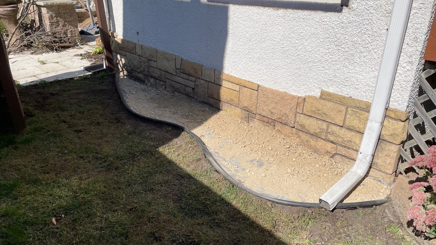 Window Wells & Foundation Grading in South Minneapolis by Waterproofing Northeast