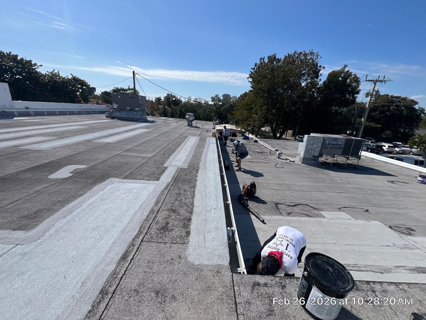 Commercial Flat Roof Restoration Using Silicone Coating in Hallandale Beach by Aastro Roofing