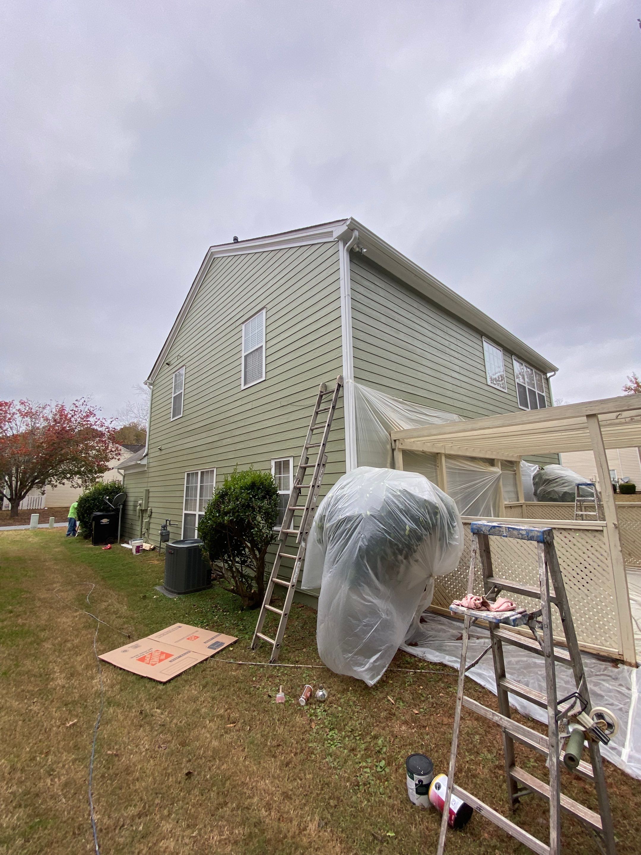 Exterior Painting for a Two-Story Sage Green Home in Kennesaw by Swift Home Renovations