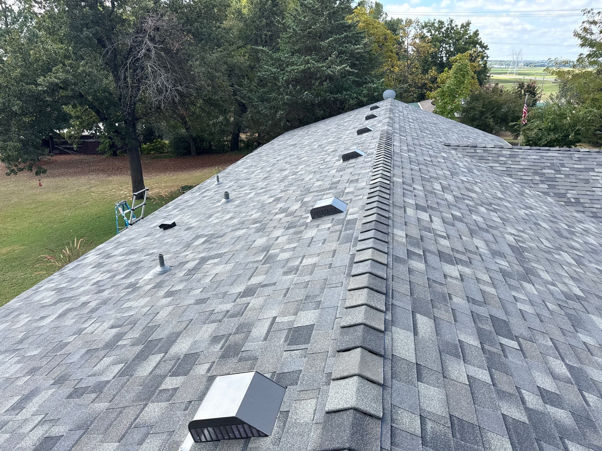 roof replacement in Harrah by McCann's Roofing and Construction