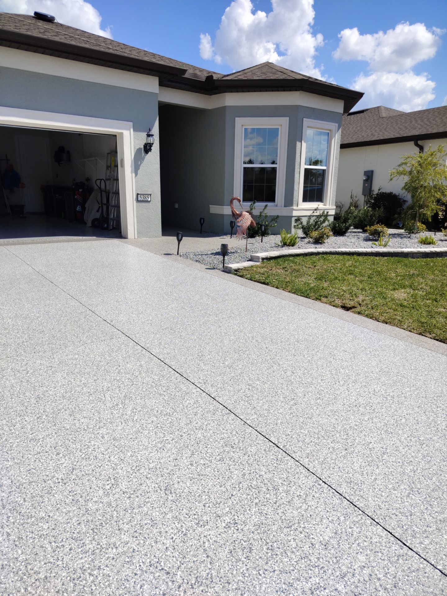 Driveway and Sidewalk in Slatestone with Silvercreek Border by Innovative Concrete Coatings 
