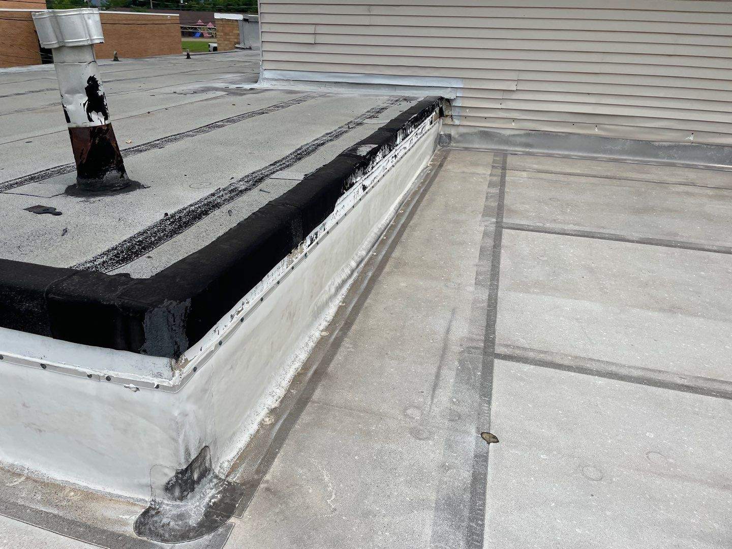Commercial Roofing Installation using 60 mil PVC by Hostetler Roofing