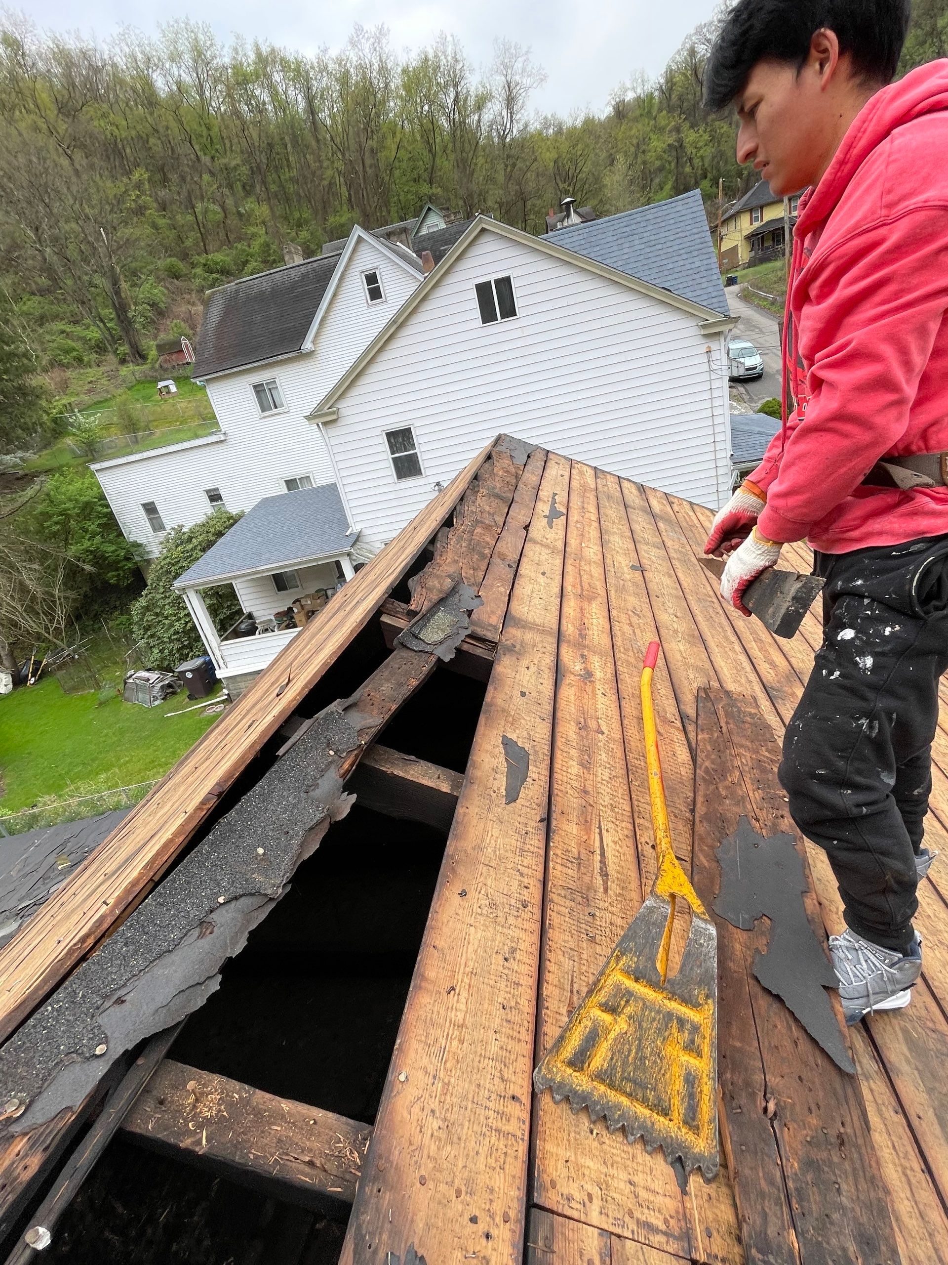 Roof sunspace deck  by Cousins Roofing Siding & Decks