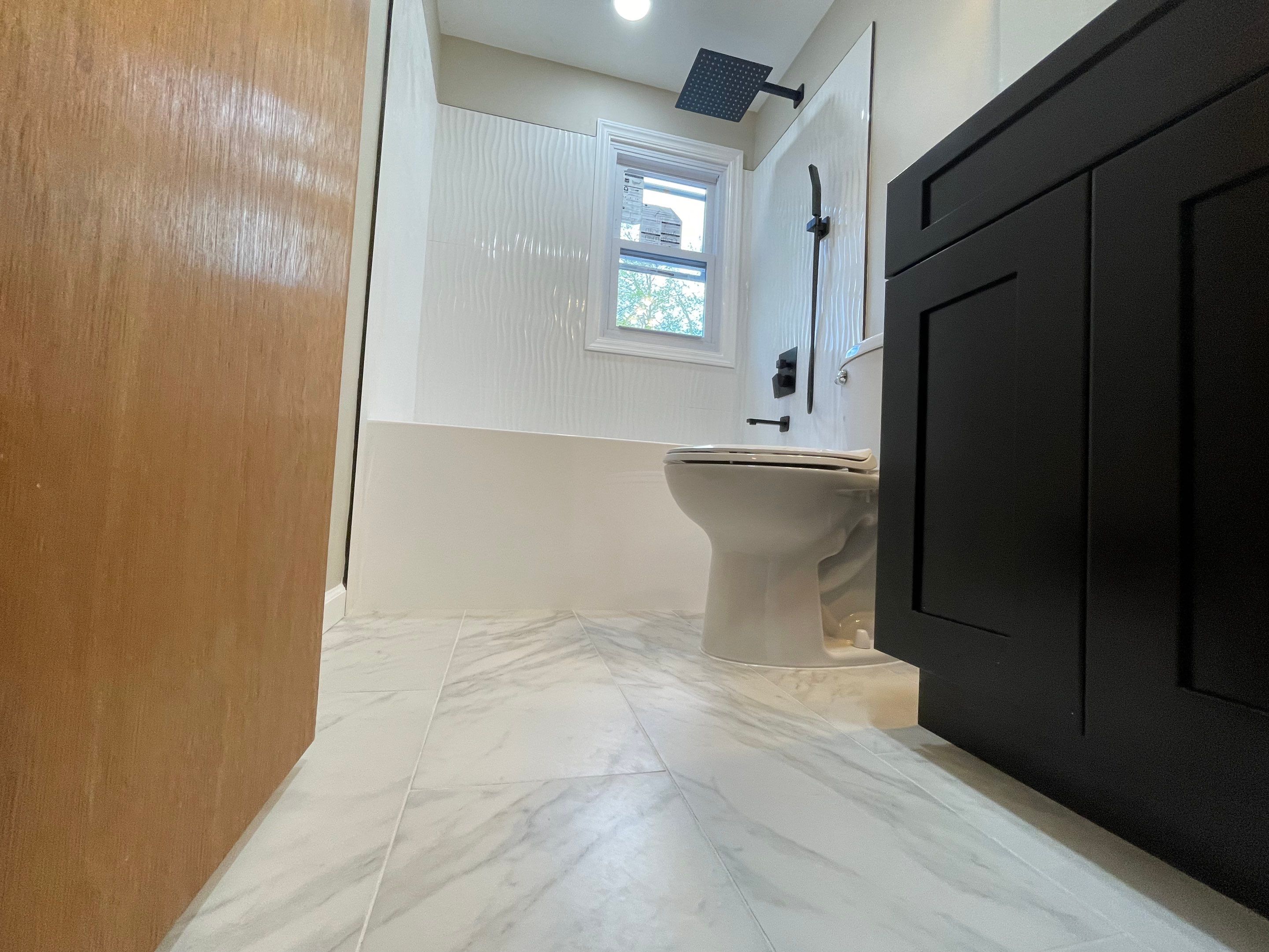 Bathroom Remodel using Tile by Home Concepts Construction