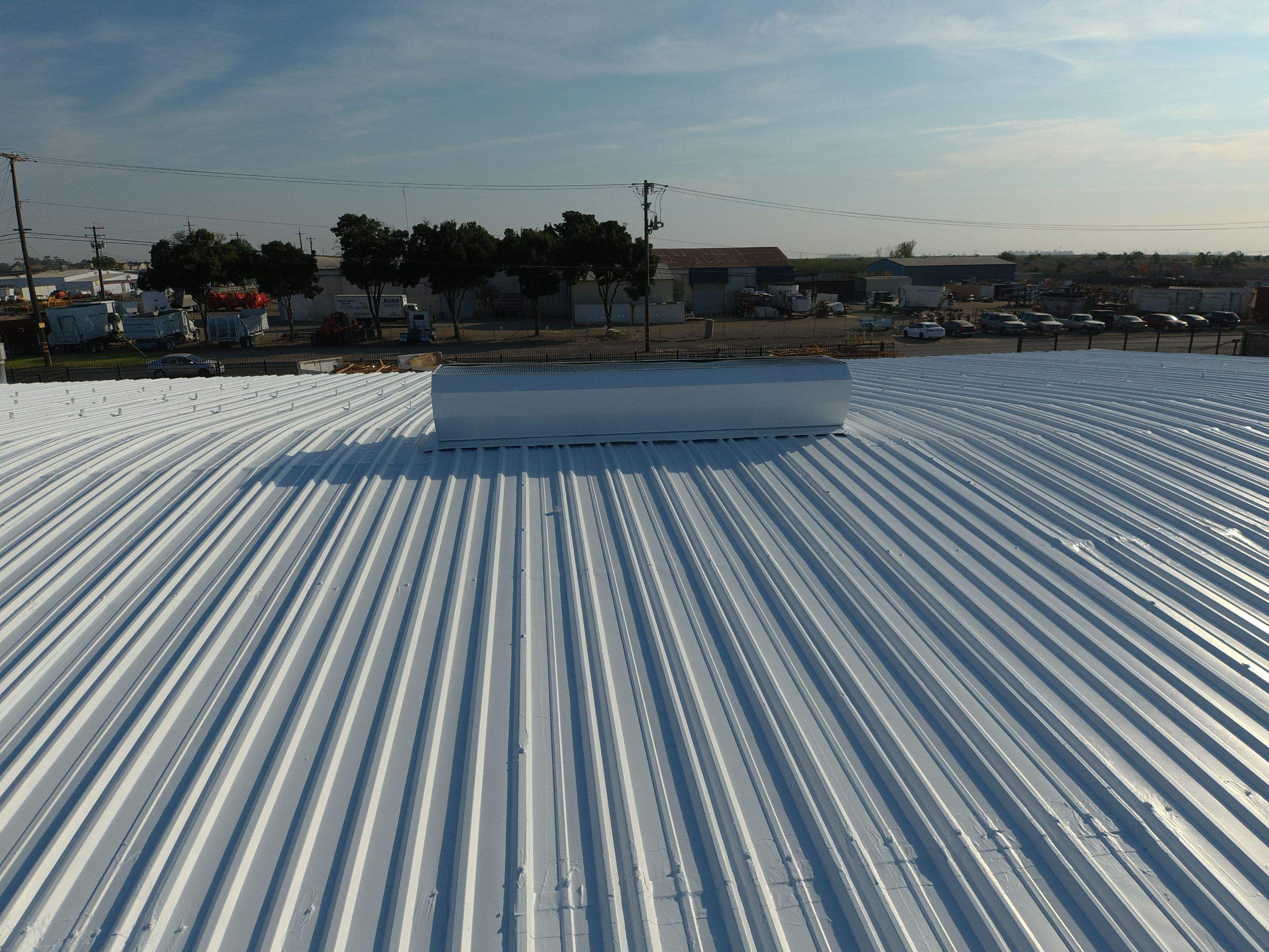 Metal Restoration Roofing system with Benchmark/PUMA XL 20 yr warranty by Straight Edge Roofing Inc