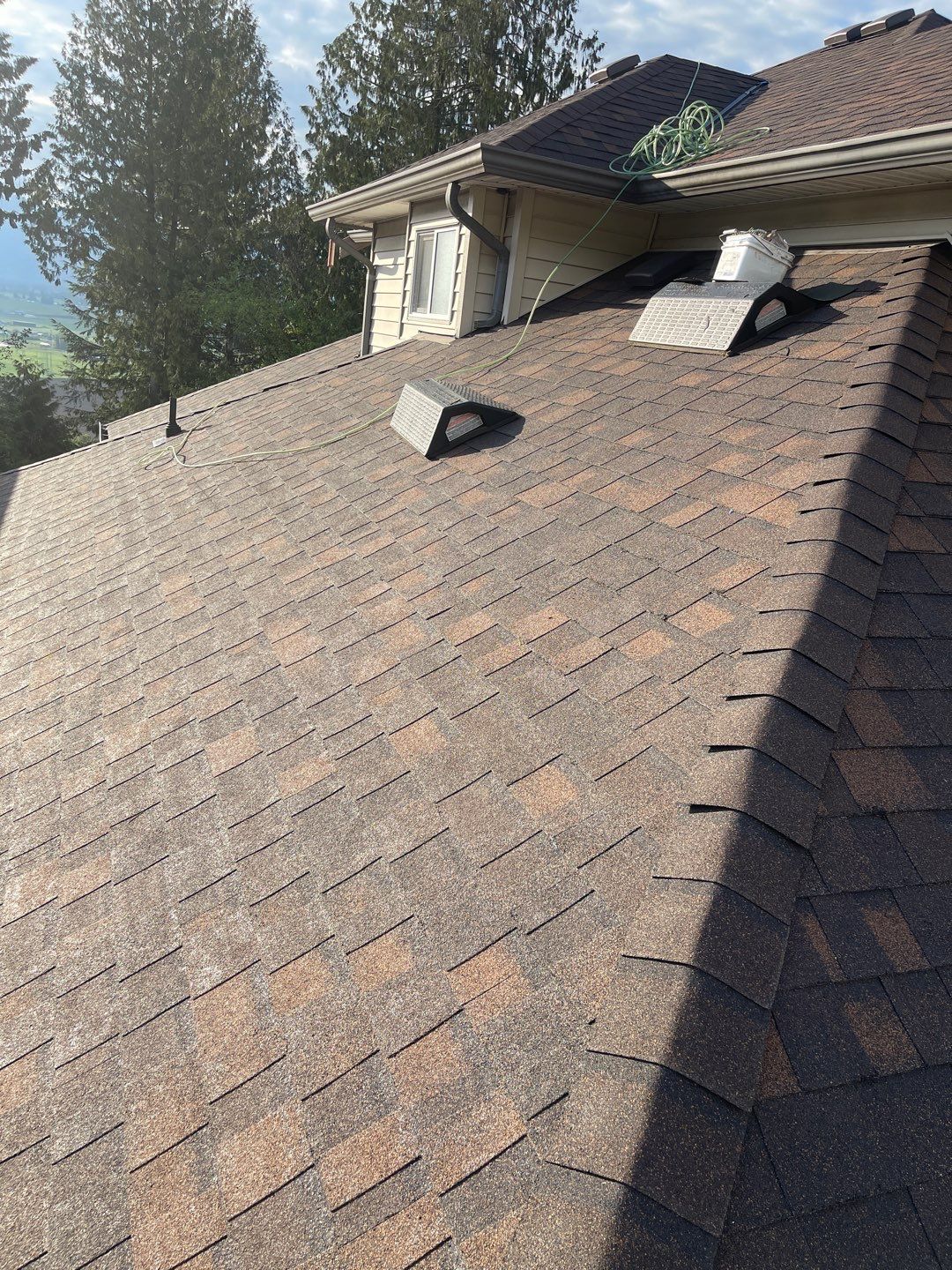 Residential Roofing Installation using OC Oakridge shingles by Top Notch Roofing Inc