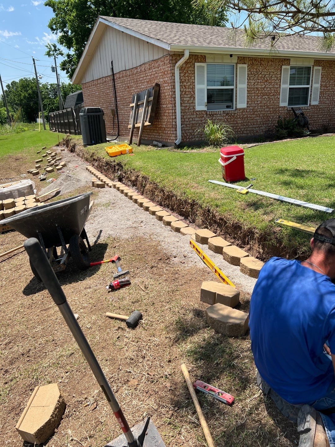 Retaining Wall using Rocks by Clays Services Inc