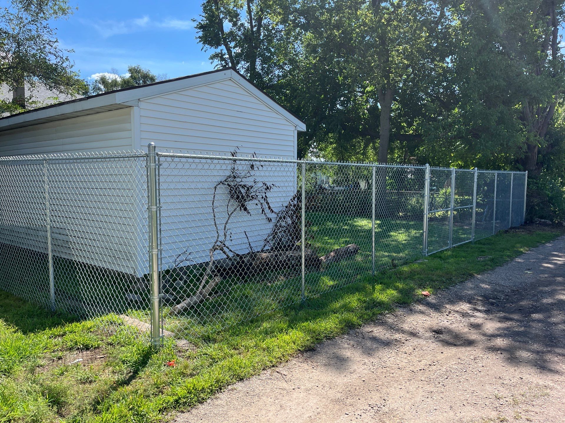 Galvanized Chain Link Fence Installation and Site Clearing in Waterloo by Perfect Picket Fence and Stain