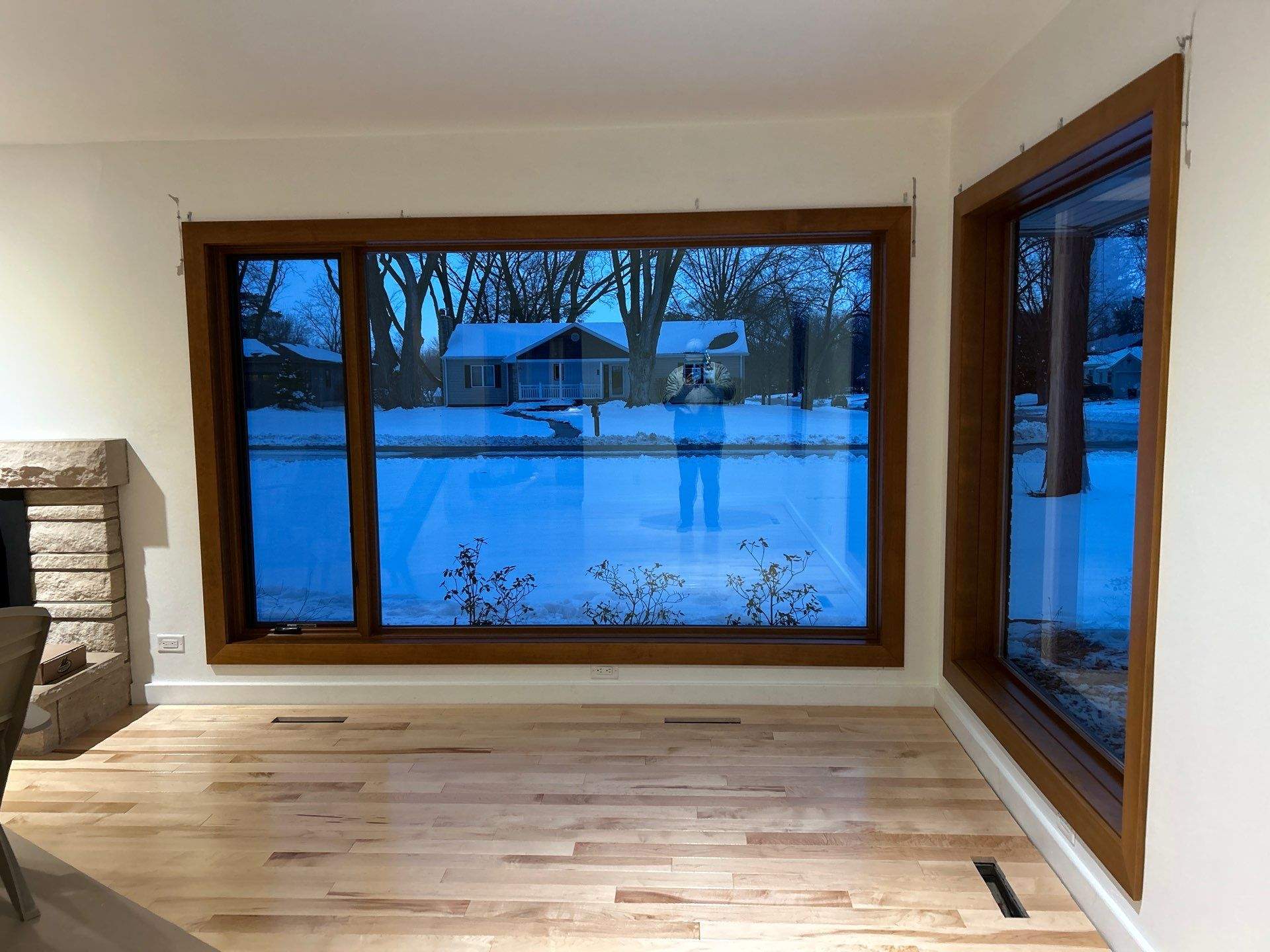 Black-Frame Pella Lifestyle Upgrade on a Partial Brick Home by United Windows and Siding LLC