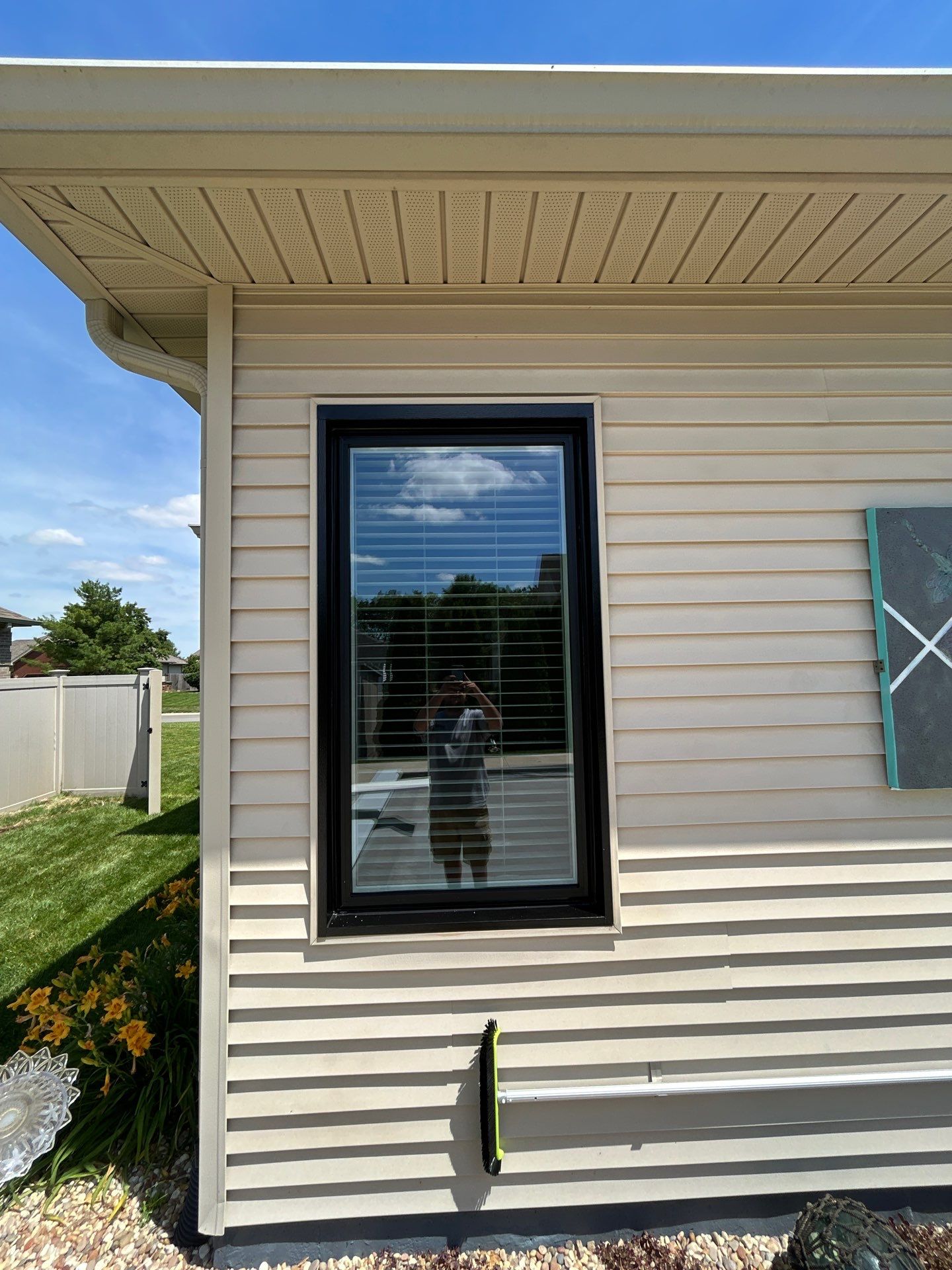 Black Vinyl Window Installation by Merrifield Exteriors, LLC