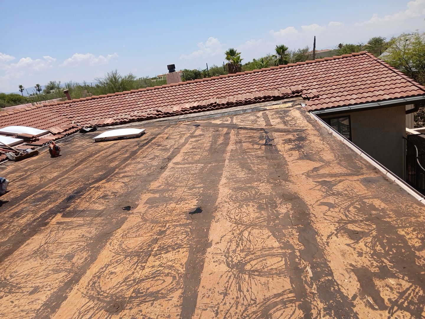 Residential Tile Roof Restoration and Low Slope Membrane Replacement in Tucson by West Coast Roofing AZ