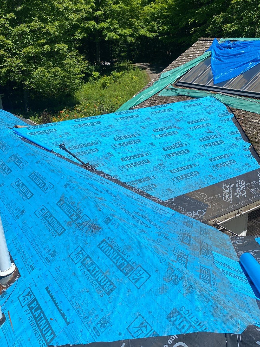 Residential Roofing Installation using 24 Ga Standing Seam Meta by Jay Carter Roofing & Sheet Metal