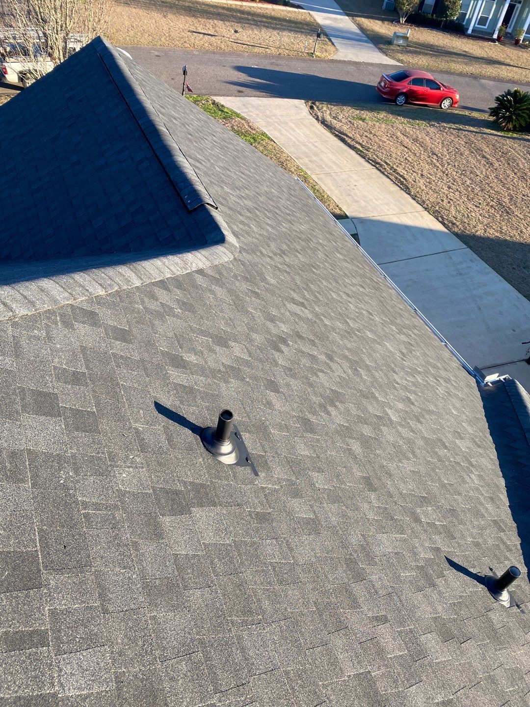Residential Roofing Installation using Roof Replacement by American Roofing & Construction LLC