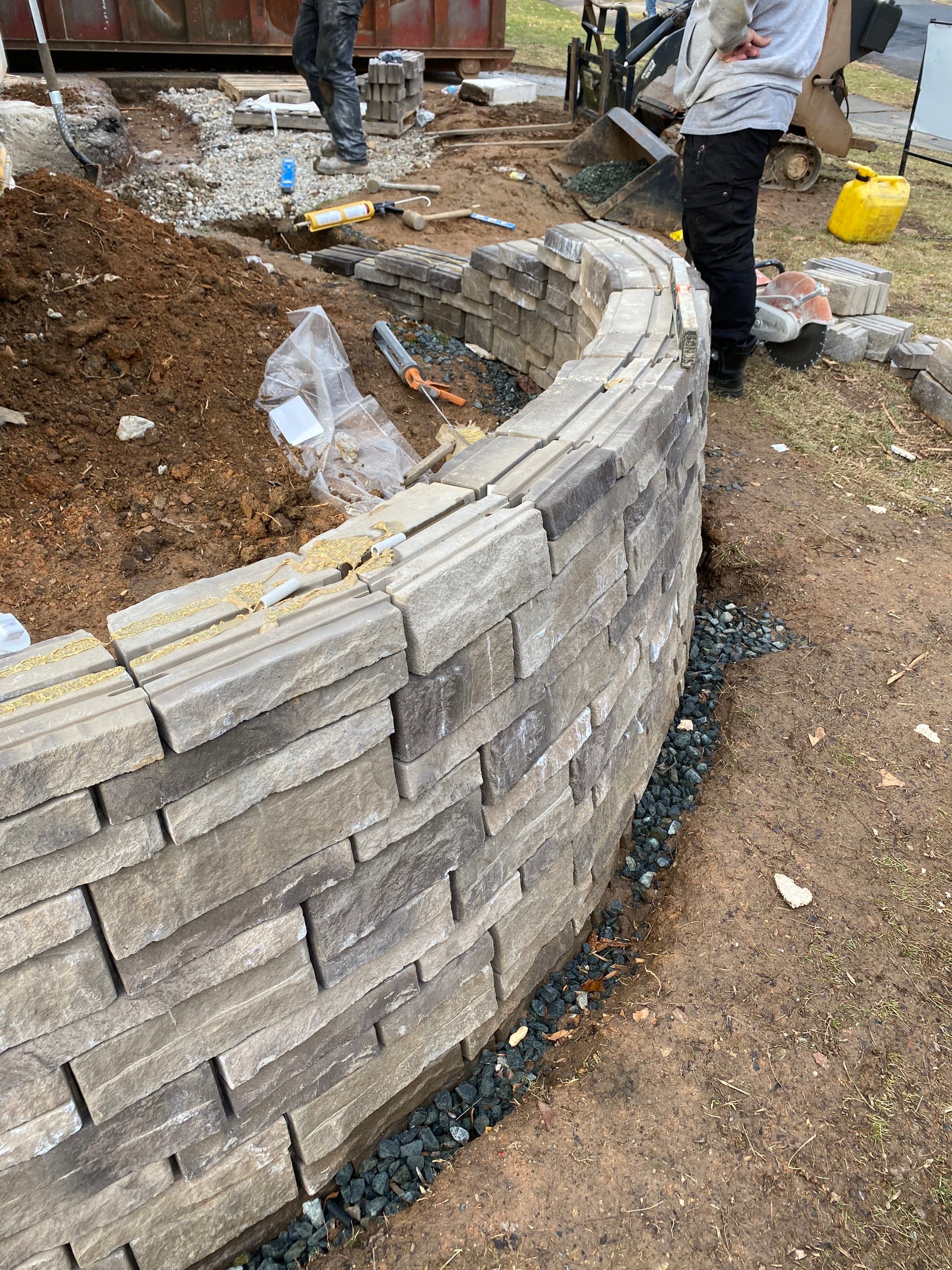 Retaining wall, walkway, small patio and landscape install by The Smet Companies, LLC