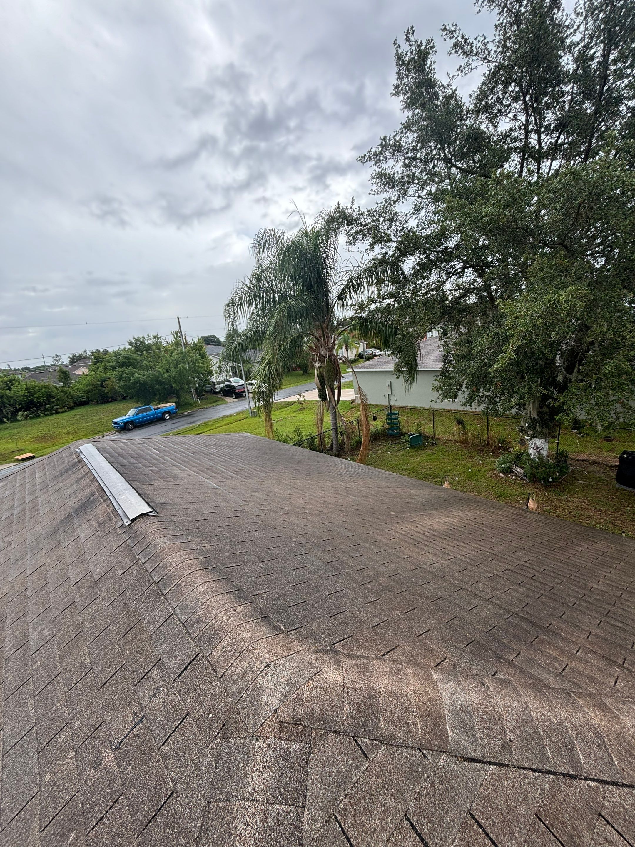 Estate Gray Shingles by Reimagine Roofing