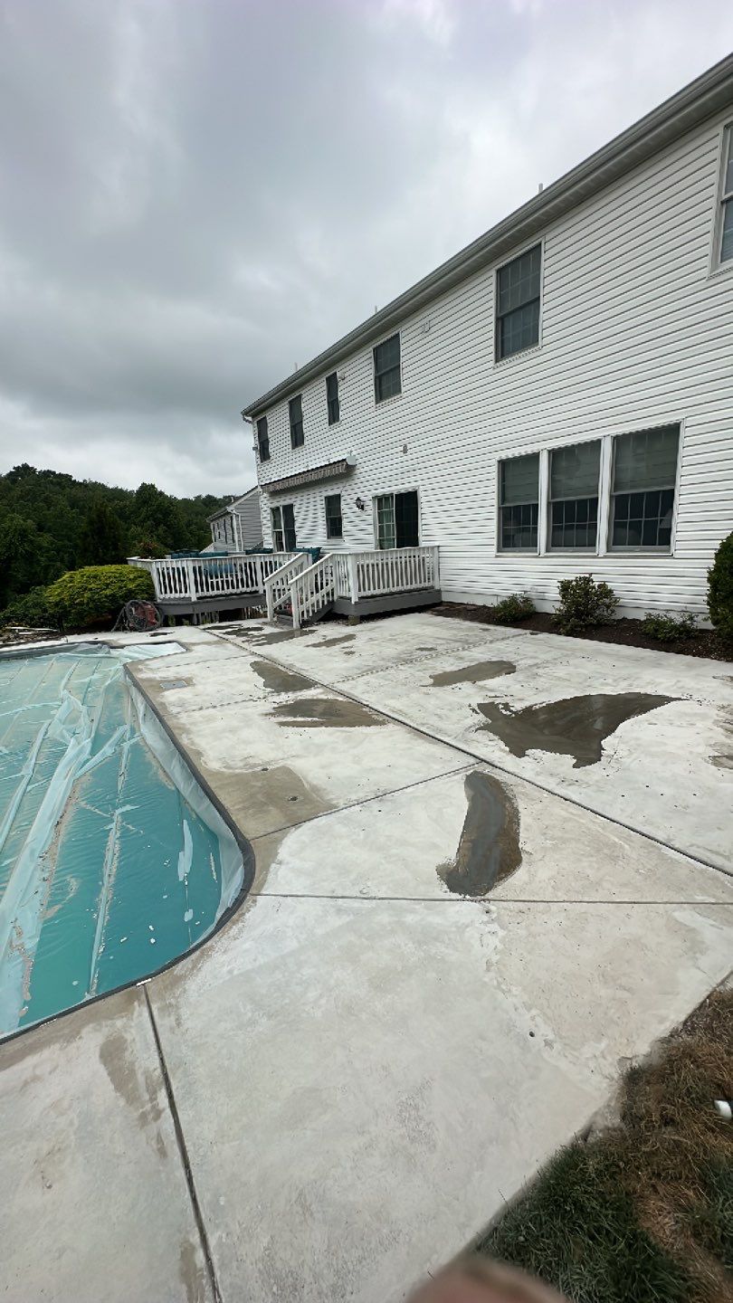 Pool Deck + Driveway + Garage Project in Venetia by Floors in a Day, Inc